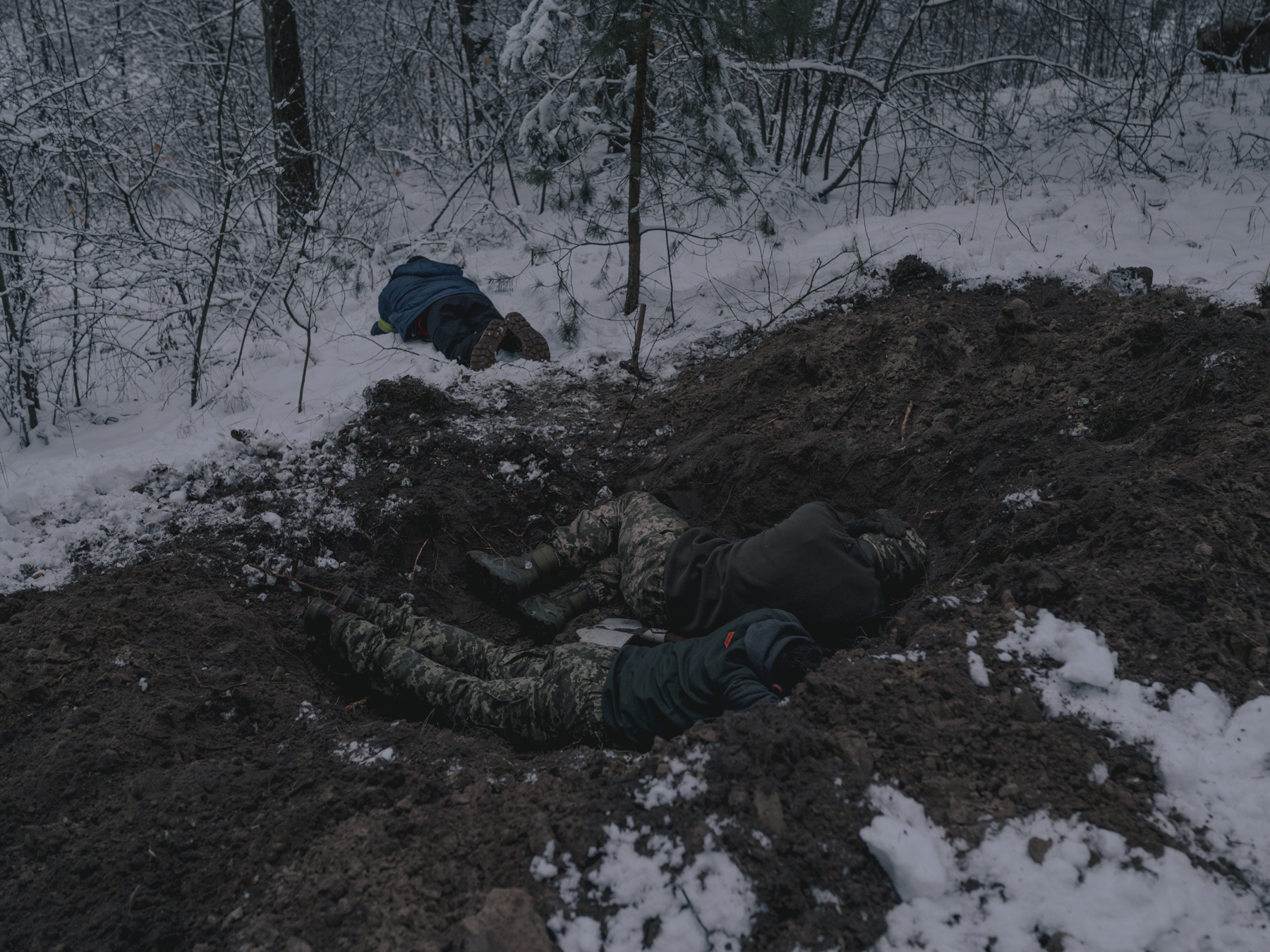 Volunteers at a military training in northern Kyiv, where a combat situation is simulated. Many of them hesitated at the beginning of the war whether fighting is the right way for them to help Ukraine, now they think it is their duty because they all have numerous friends and relatives who have been doing it for months. Kyiv Oblast, 19.11.2022.