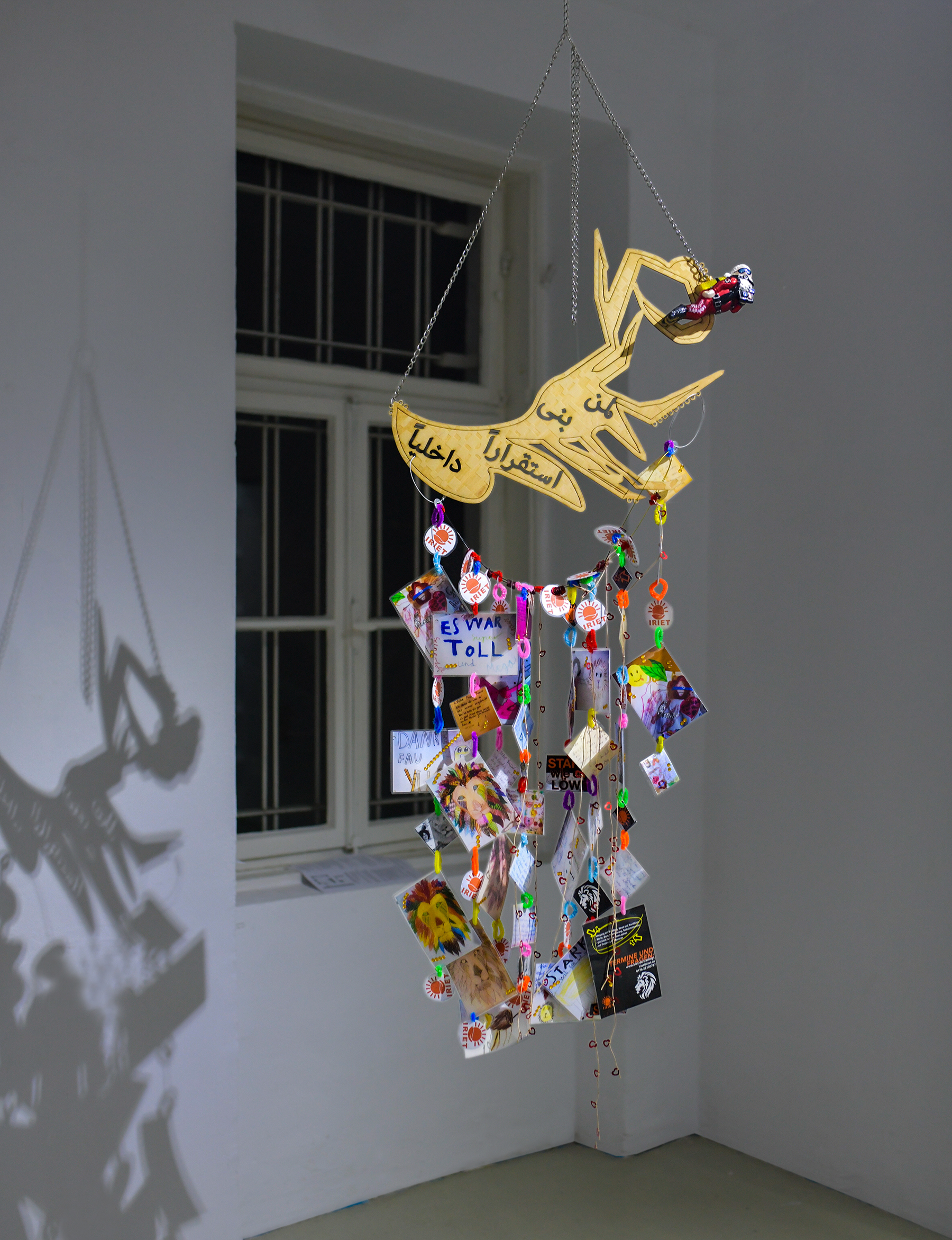 Leonid Hrytsak_Scuba Santa - For Peace's Sake; Franziska Windolf with a quote paraphrasing Adnan Al-Dhahir_'To those, who build stability from within'; Iriet Yusuf and her primary school pupils from Giesing_Lion. Image: Tom Hauzenberger.