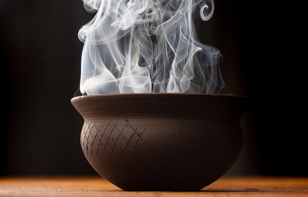 Akoko Restaurant, Fitzrovia, London. Serving bowls in black clay and espresso cups in dark oil-spot glaze. 