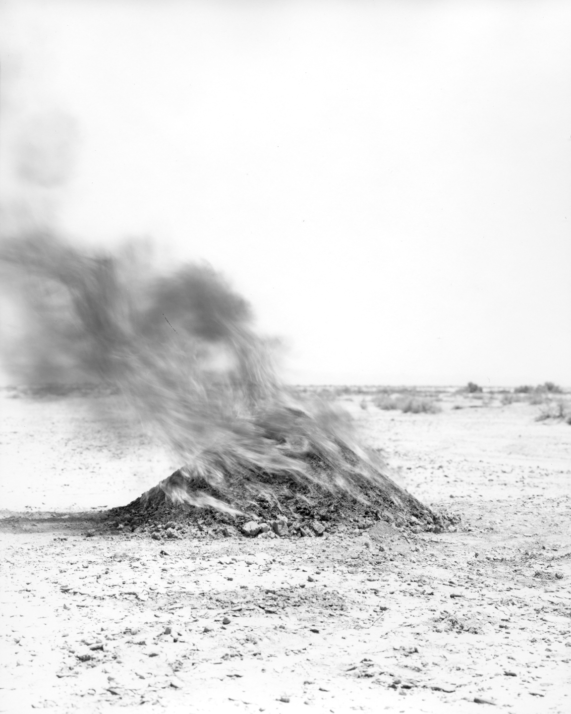 Mound of burning soil approximately 15.1 miles from test site. Silver Gelatin Fiber Print 2015