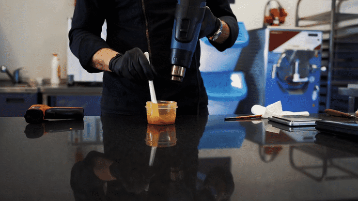Heating cocoa butter with hair dryer