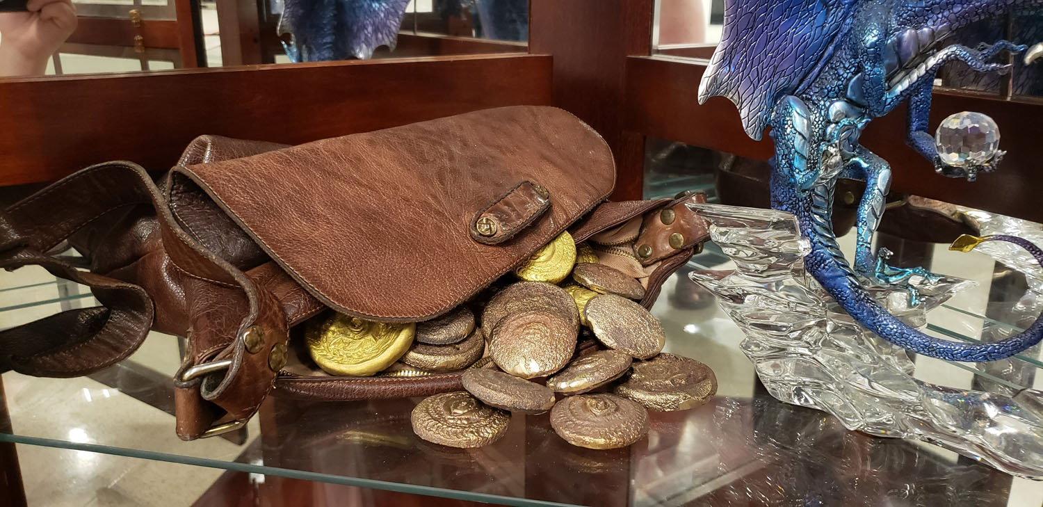Adventurer's PouchLeather bag filled with cast bronze coins and miscellaneous findings, 2022