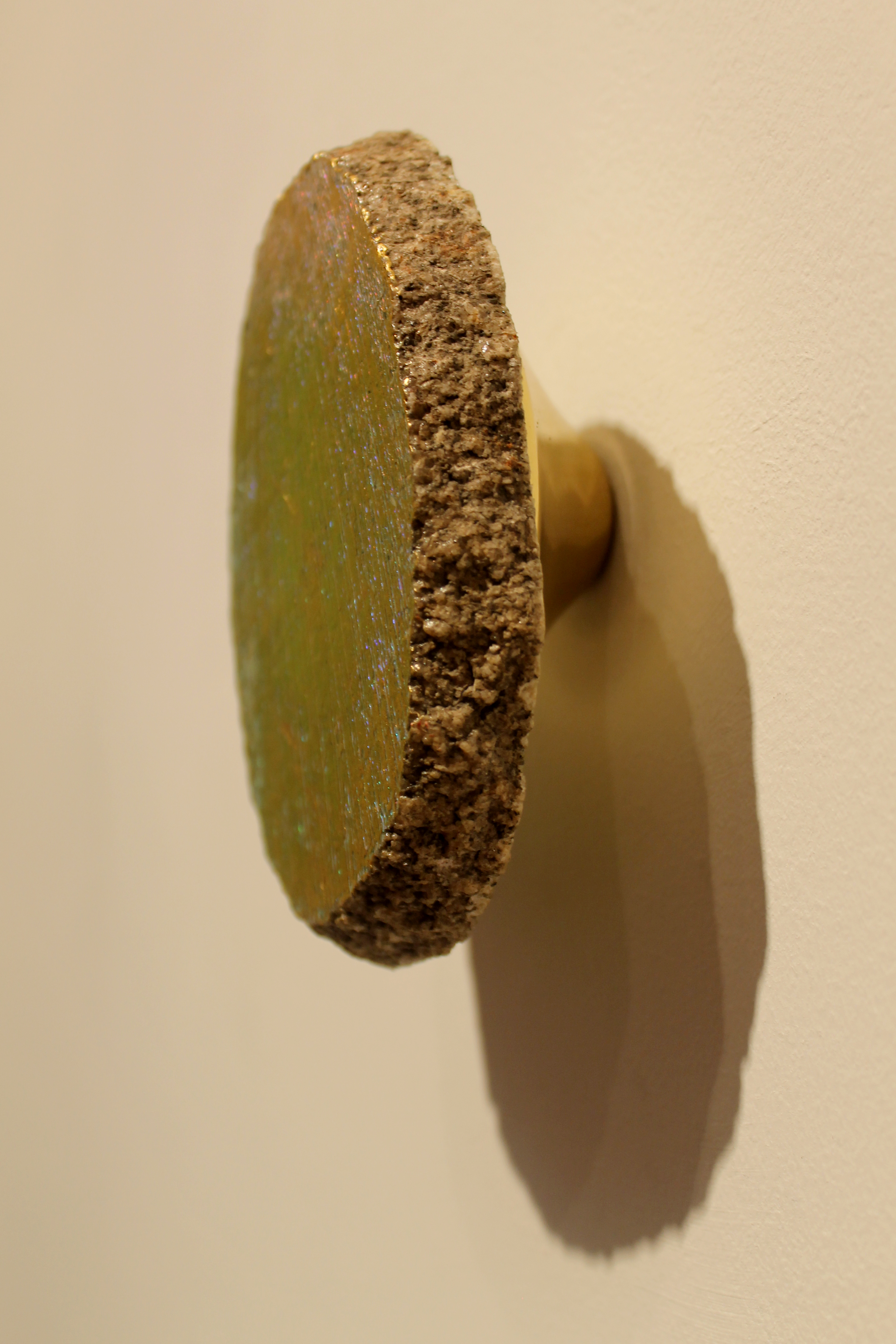 Iowan Erratic, 5 x 8 x 3 inches, brass, hot-pressed foil and Iowan Glacial Erratic 