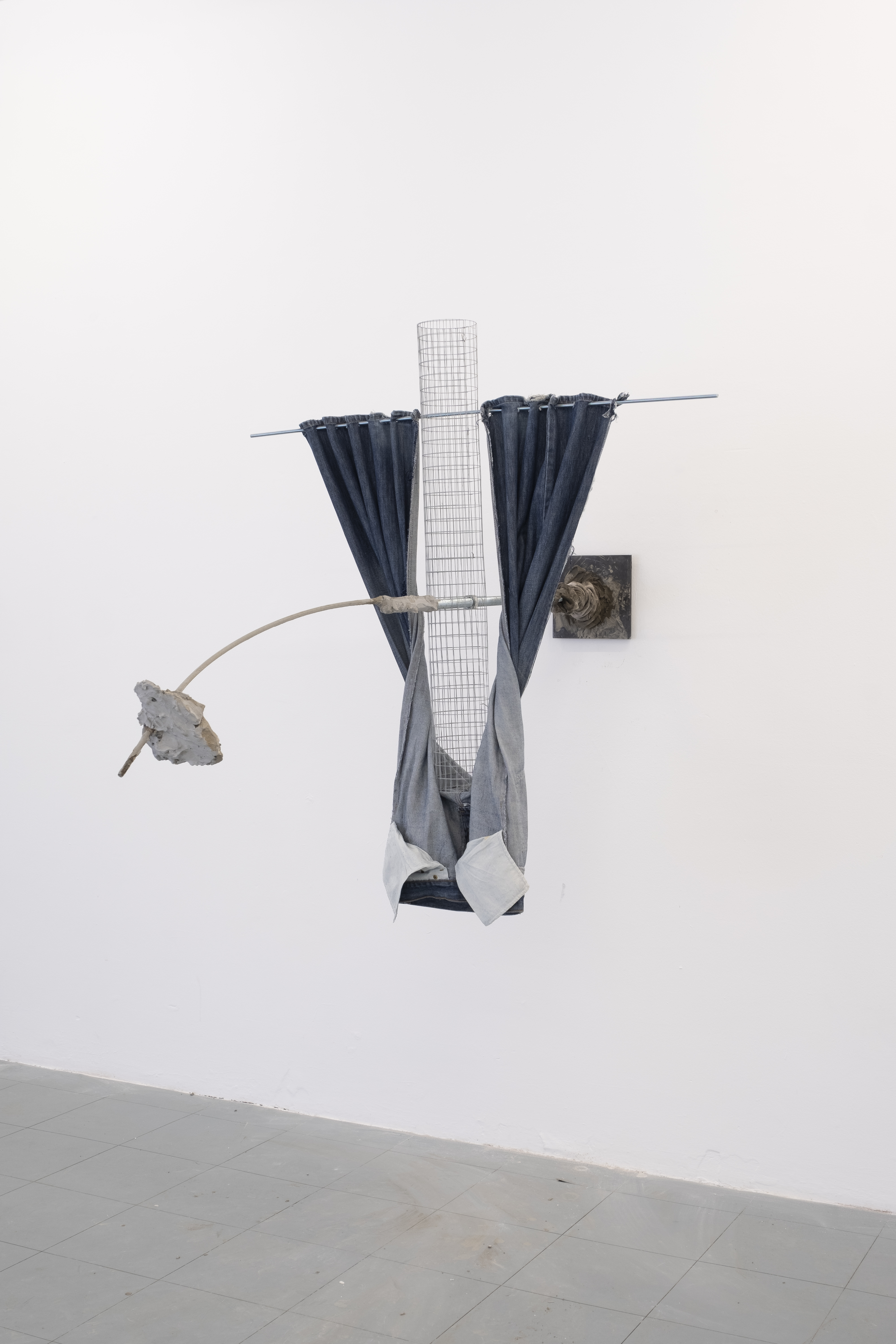 Heart Blasted, 2021, (Jeans, Steel, Fencing, Concrete, Threaded Rod, Sock.) 1m x 1.3m x 2.1m