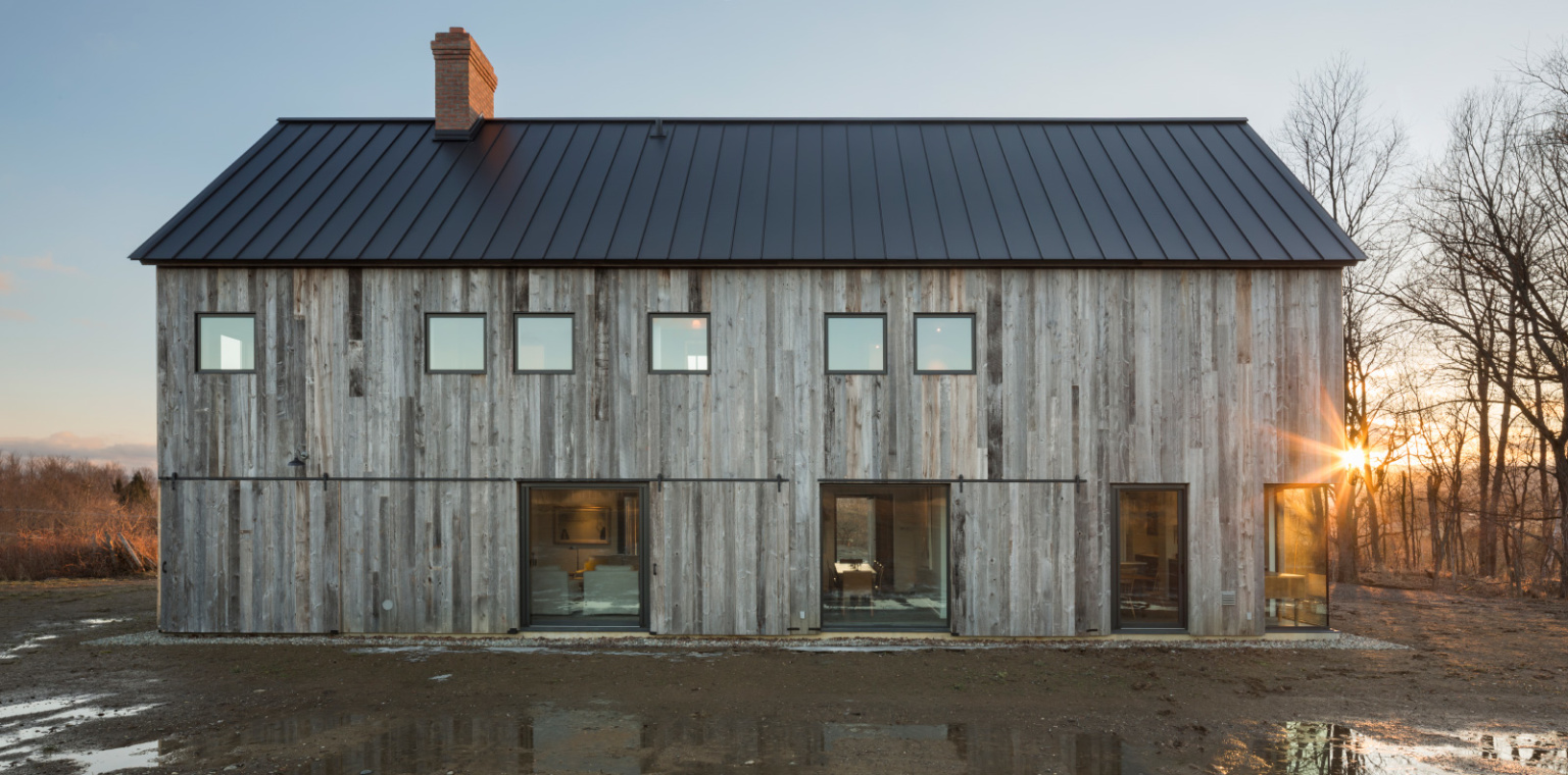 Townships Farmhouse exterior, 2017, in North Hatley, Quebec. (Photography by Stephane Groleau and Laetitia Boudaud/Courtesy LAMAS)