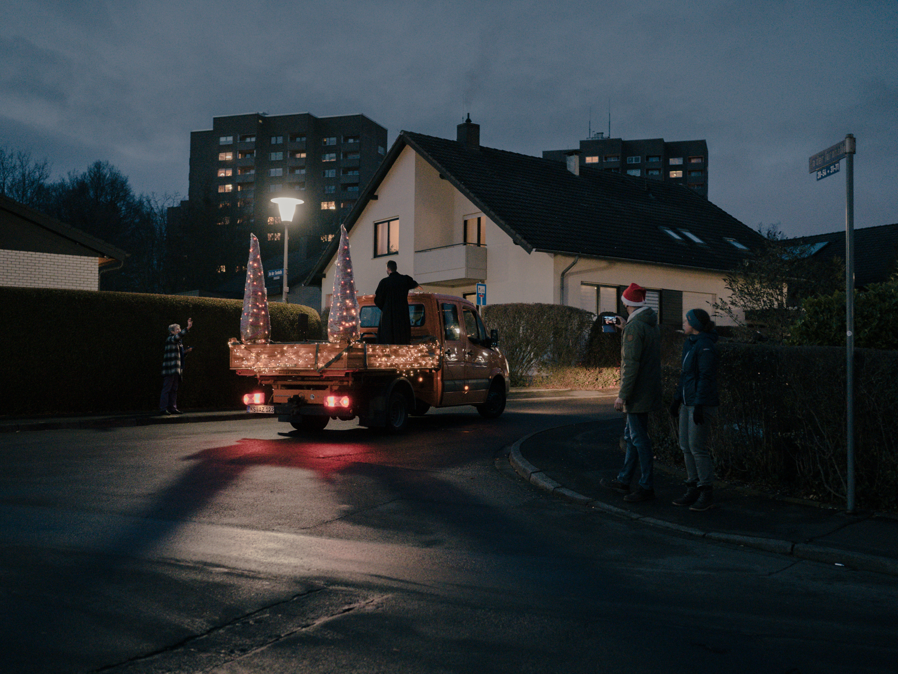 Pastor Björn Henkel drives through Kassel Niederzwehren on Christmas Eve with a mobile church service. For this, Christmas music was recorded beforehand by a musician from Kassel, Germany. - 24.12.2020