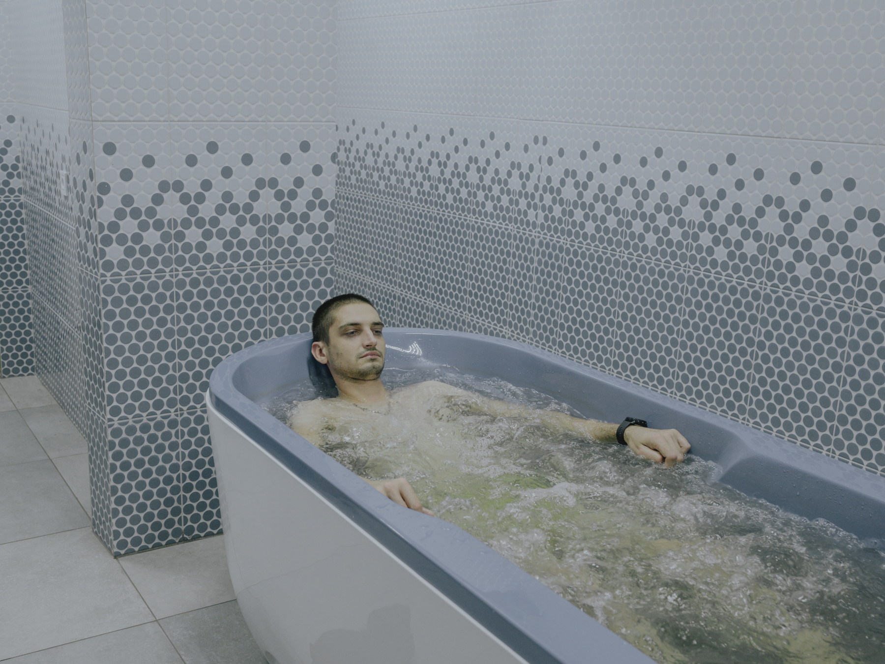 Valentyn, a soldier who has fought for Ukraine since the full-scale invasion, suffered severe back injuries from his deployment and is now attending a rehabilitation program at a Kyiv military hospital. Kyiv, 16.11.2022.