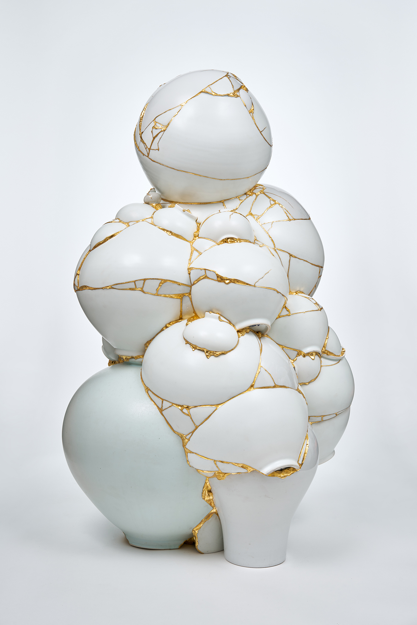 YeesookyungTranslated Vase_2021 TVW 6, 2021Ceramic shards, epoxy, 24K gold leaf44 1/2 x 11 x 11 in113 x 71 x 72 cm