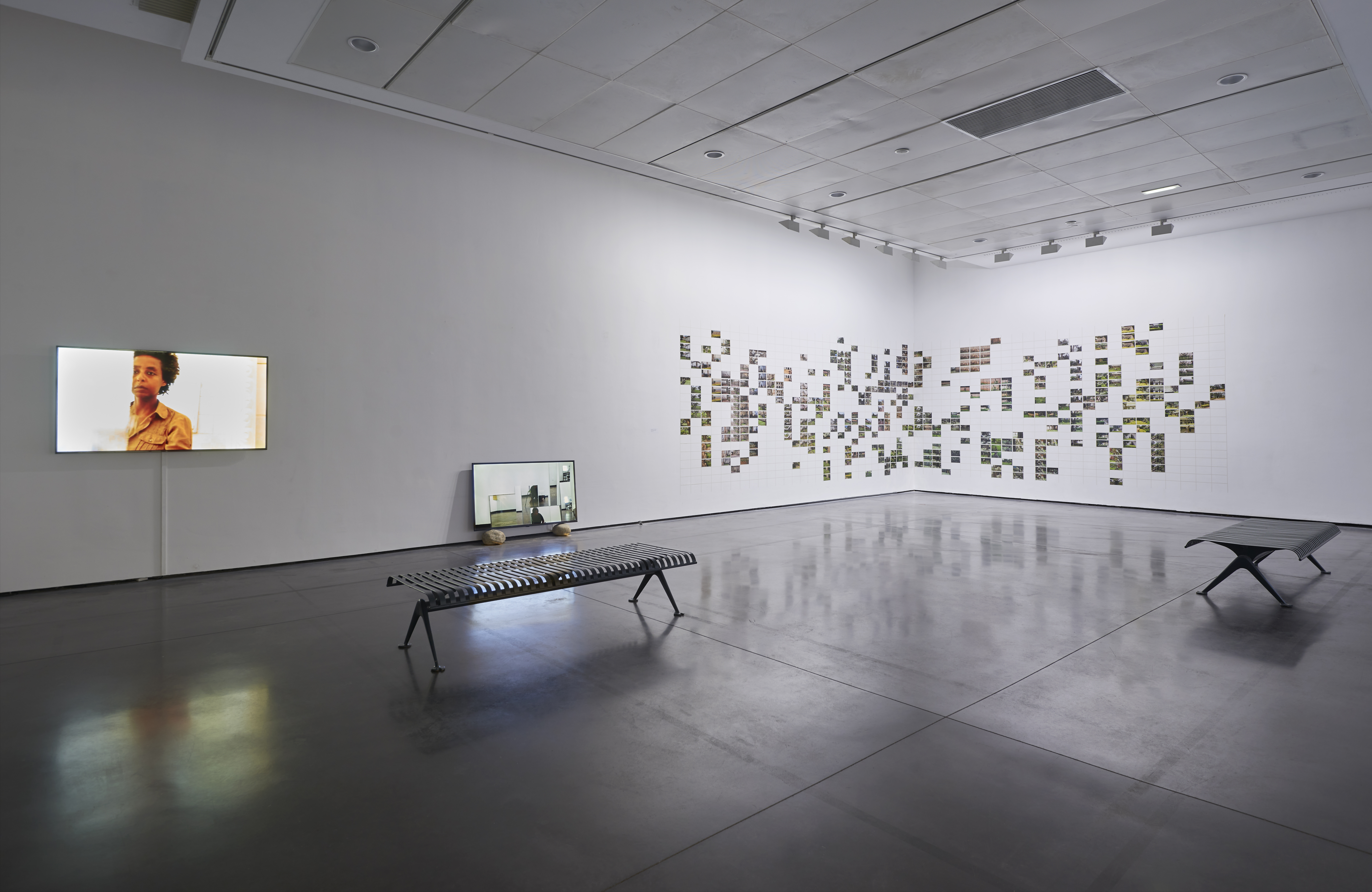 perception conjugation, 2019 HD video, color w/sound, monitor, rocks, gold shadows 17:52 mins Exhibition view "Beyond What We See. Once Upon a Time, Once Upon a Future," 16.12.2020 - 29.08.2021 © les Abattoirs, Musée – Frac Occitanie Toulouse; photo : Damien Aspe