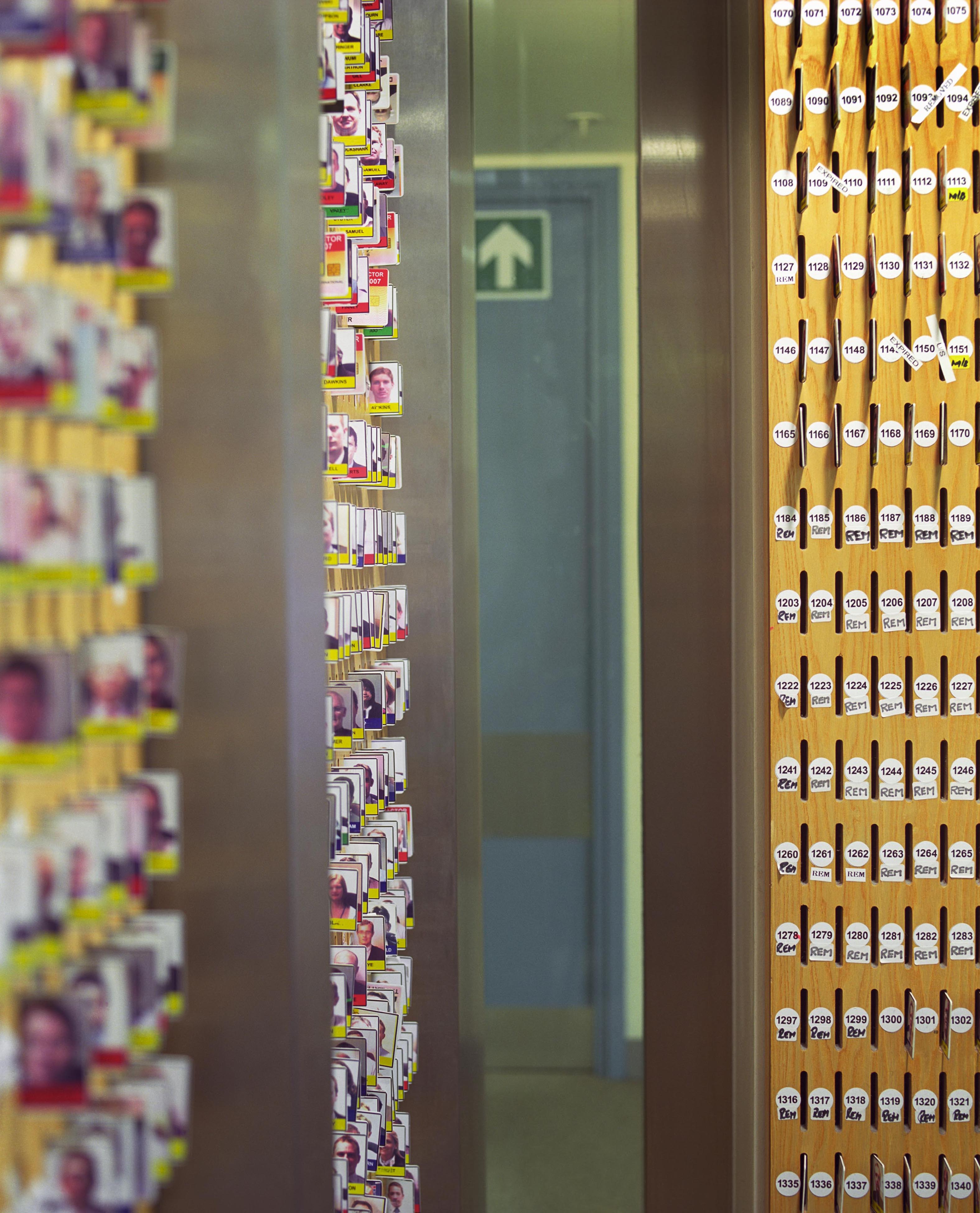 ID cards at lower entrance [digitally censored]