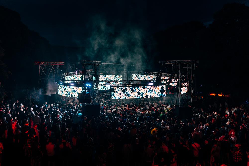 Max Cooper performing with large-scale visuals and lighting at IMMERSE stage