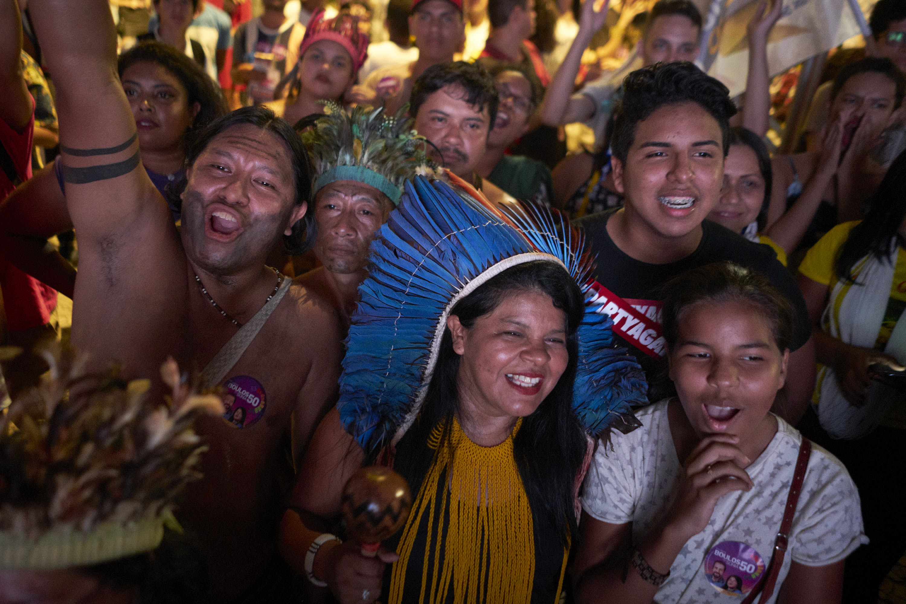 Sonia accompanied by her relatives (left) and her son Yaponã and her daughter Ywara while watching her presentation video before coming on stage, during the act in Belém do Pará, Brazil.