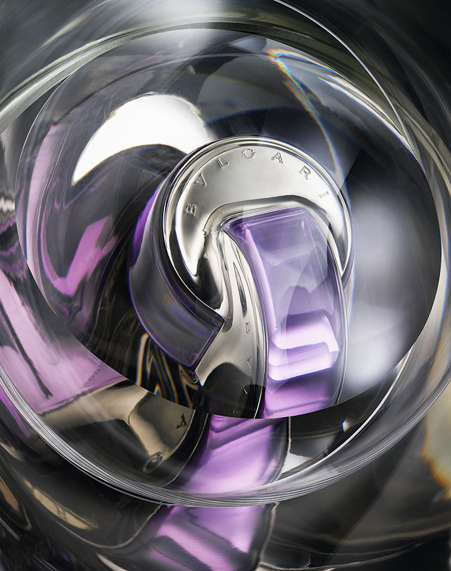 KMA photographer Daniel Schweizer photographs a silver and purple object under glass with lots of reflections 