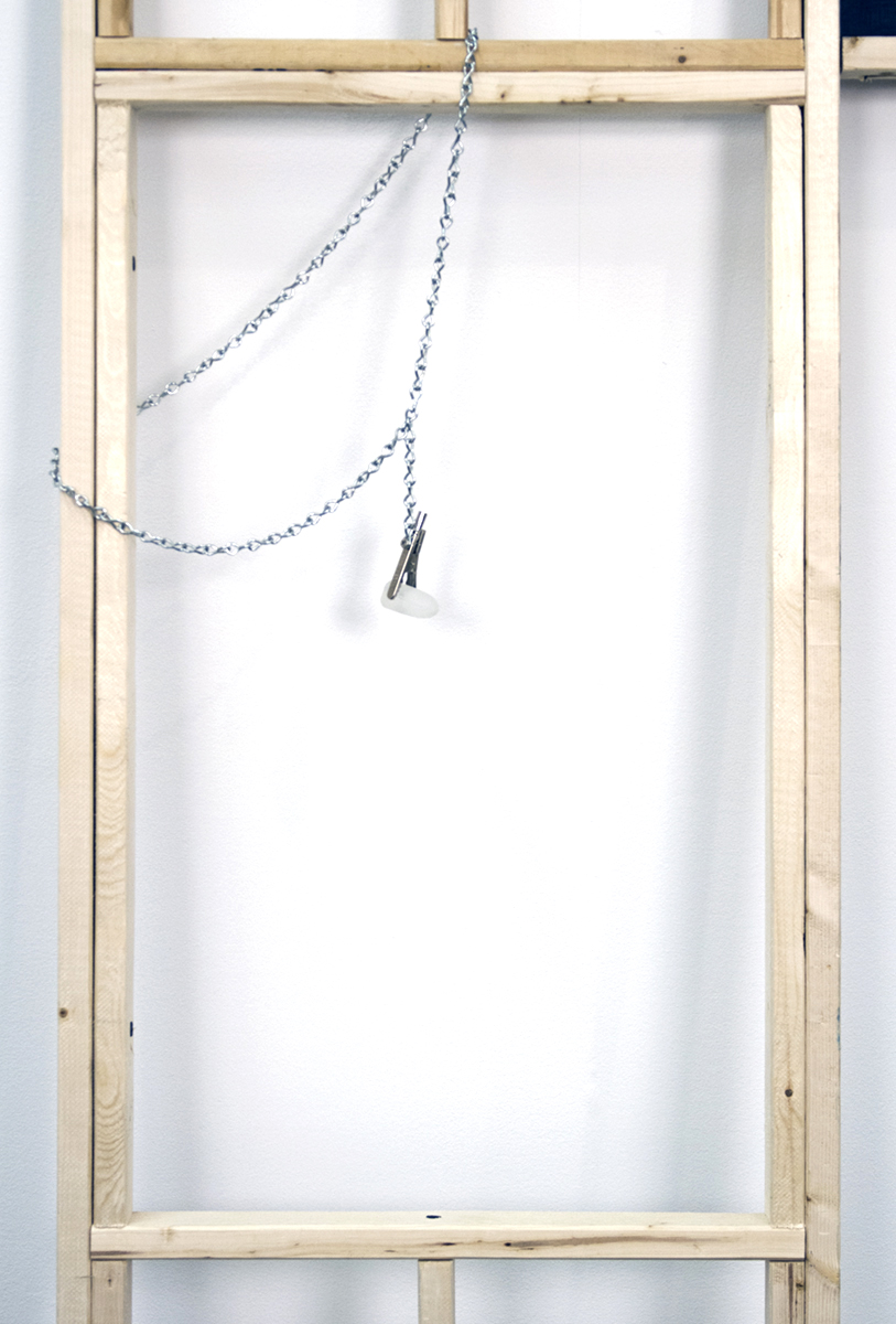 Detail of Suncatcher (And Lou Reed Playing), 2018, dimensions variable. Wood, screws, concrete blocks, steel chain, steel clip, epoxy resin, oil on panel