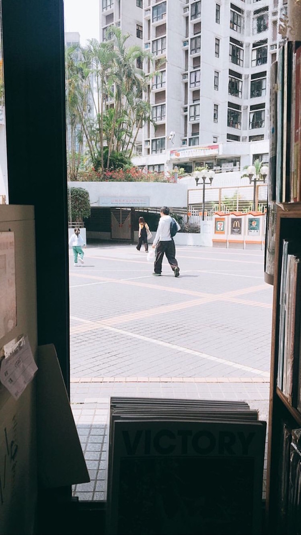 People watching from a window in Kubrick Bookshop © Yoshika Kon