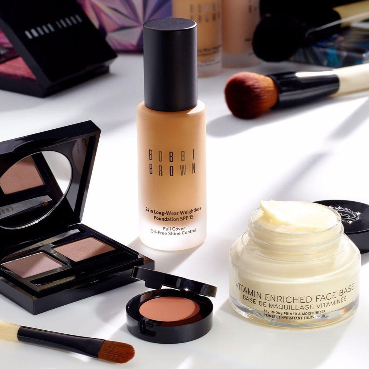 KMA photographer Vincent Gapaillard photographs many Bobbi Brown beauty products on a white surface