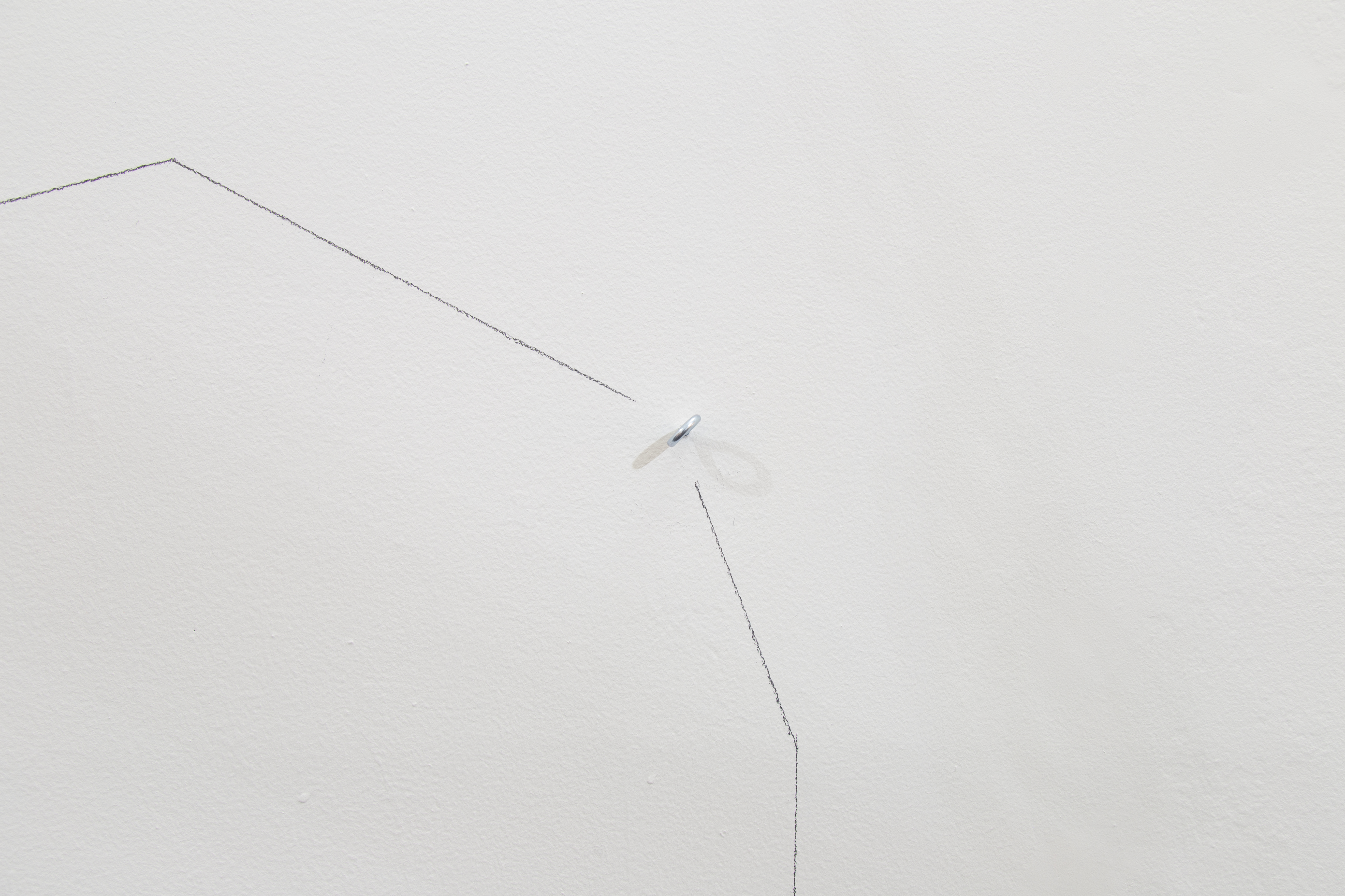 Detail view of wall drawing with screw eye.