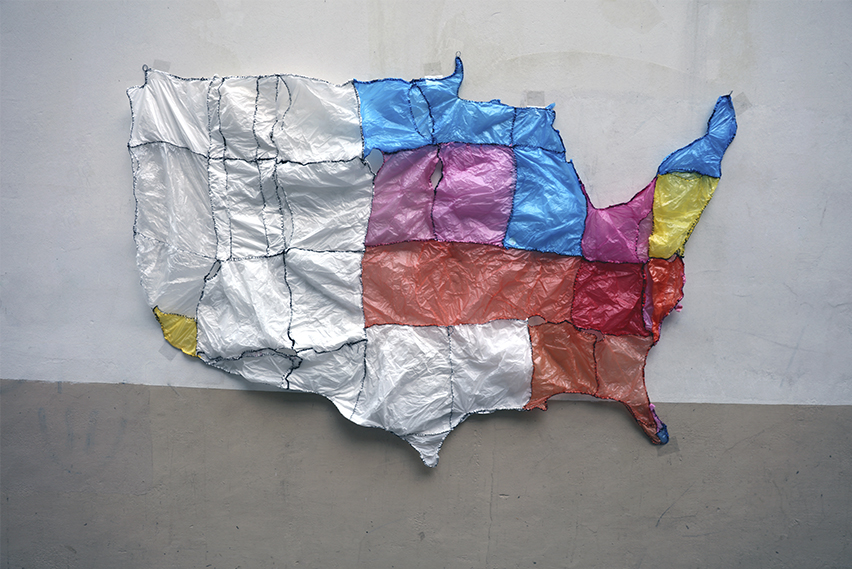 “Disposable America”, (2016) is a US map made out of Chinese polyethylene shopping bags stitched in black cotton thread.