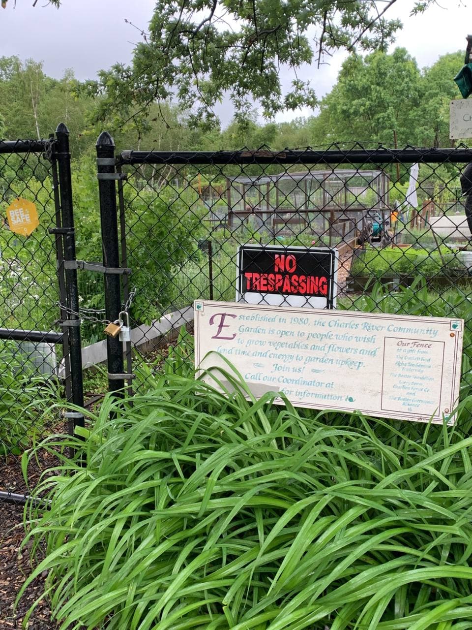 A no trespassing sign at the Charles River Community Garden