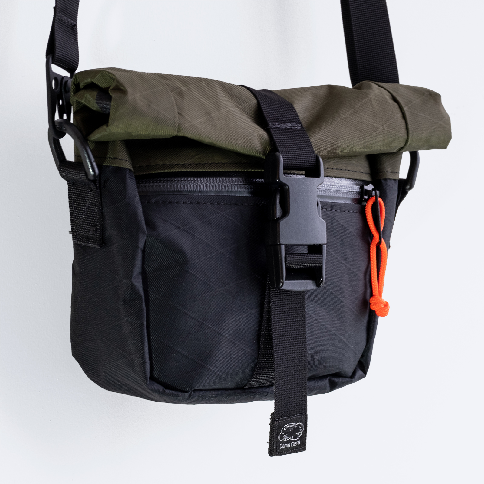 Roll top 2024 sling bag