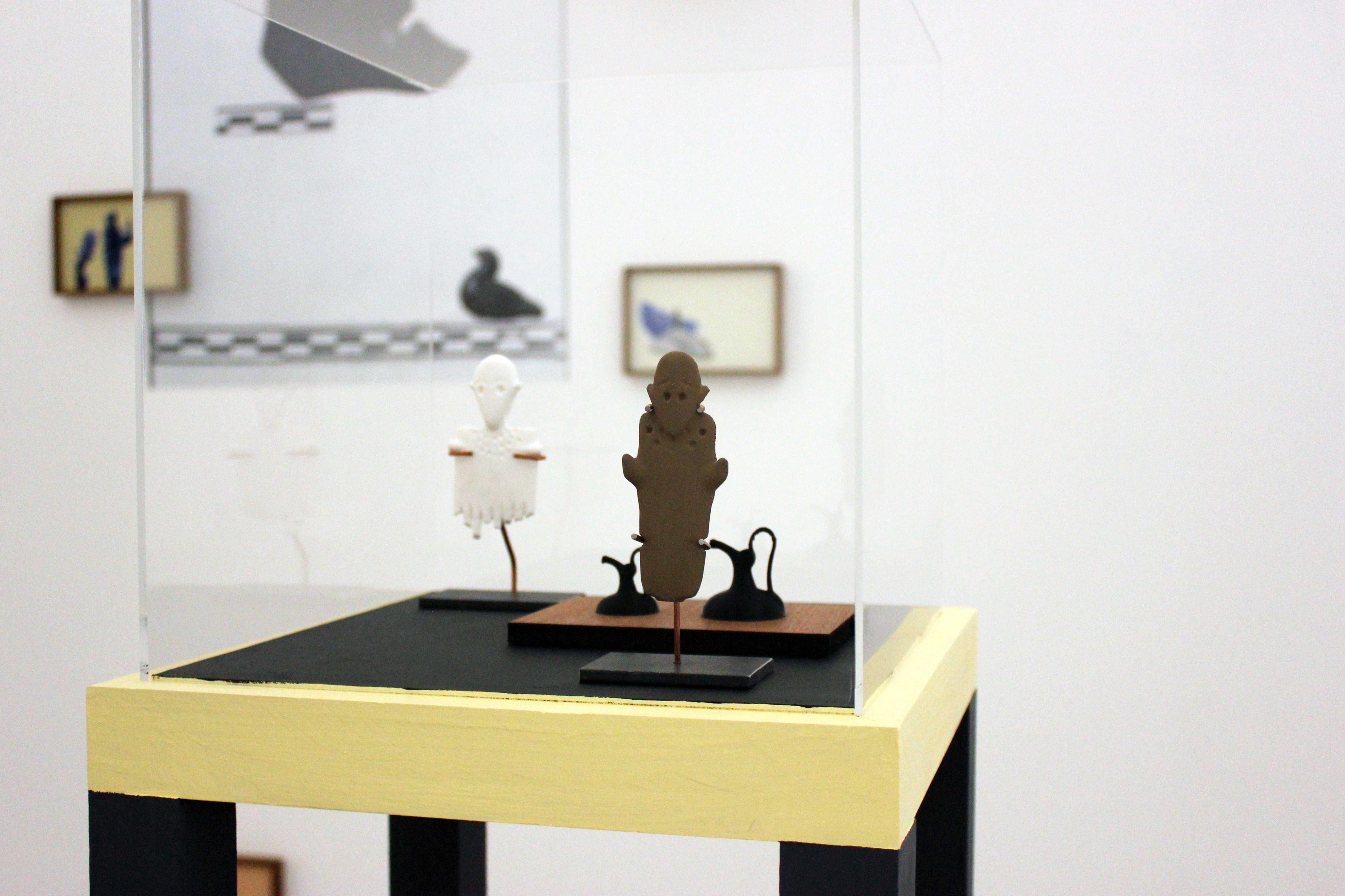 30cm Acrylic display cube on plinth, 3-D printed artefacts