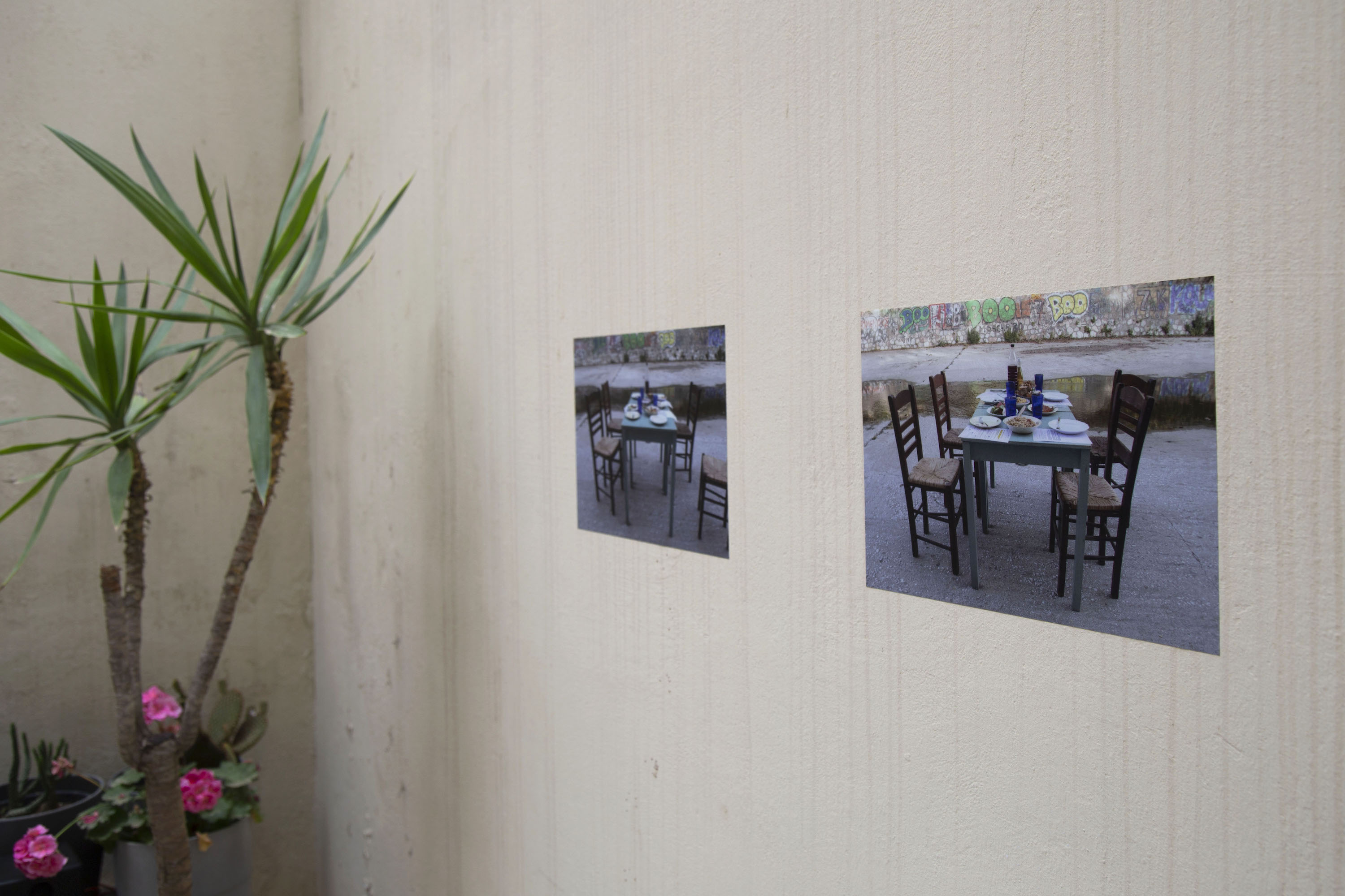 Before and after photos of the dinner on the wall.