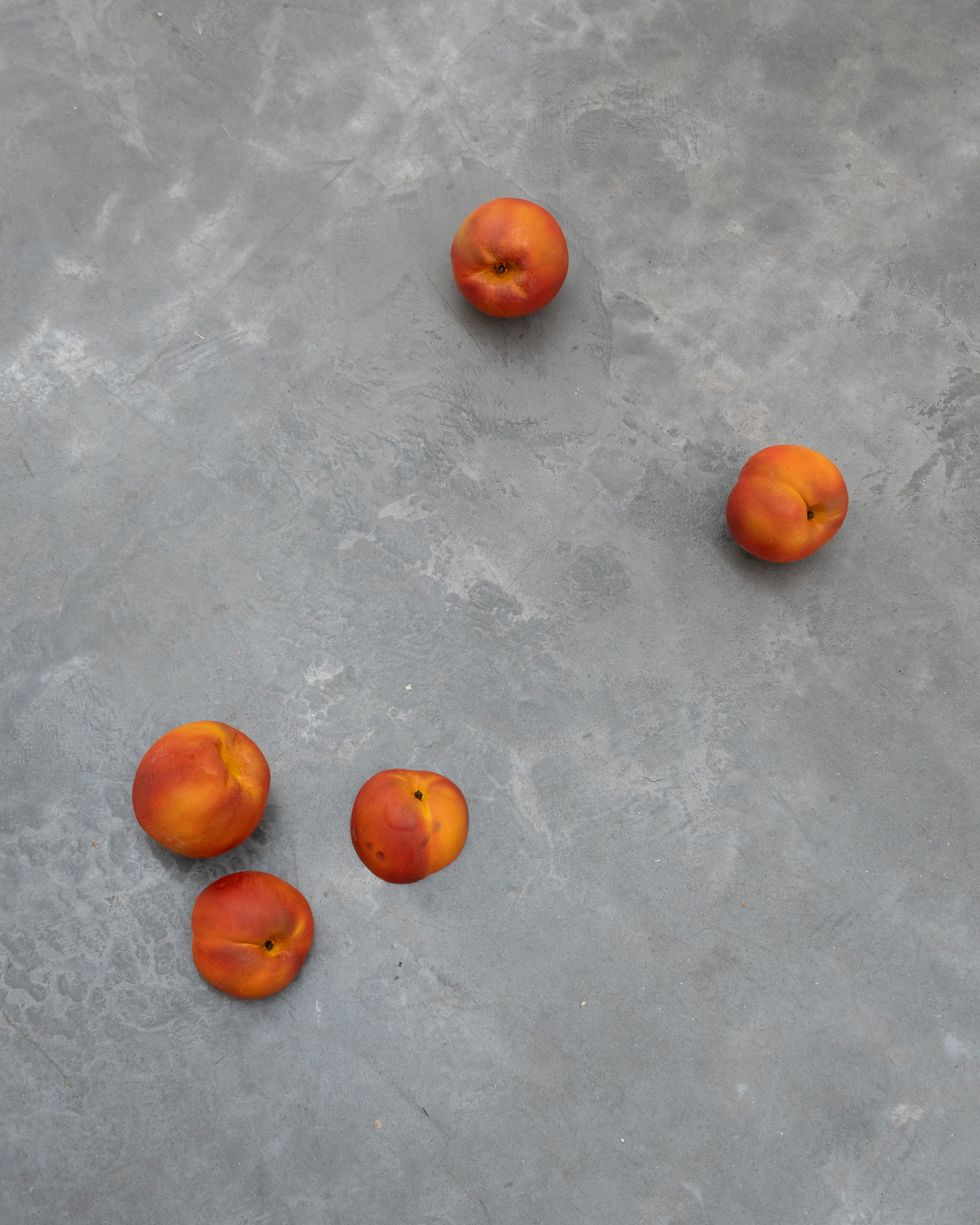 Minefield, 2022, cast urethane, epoxy, acrylic paint, 2.5 x 2.5 x 2.5 in. each