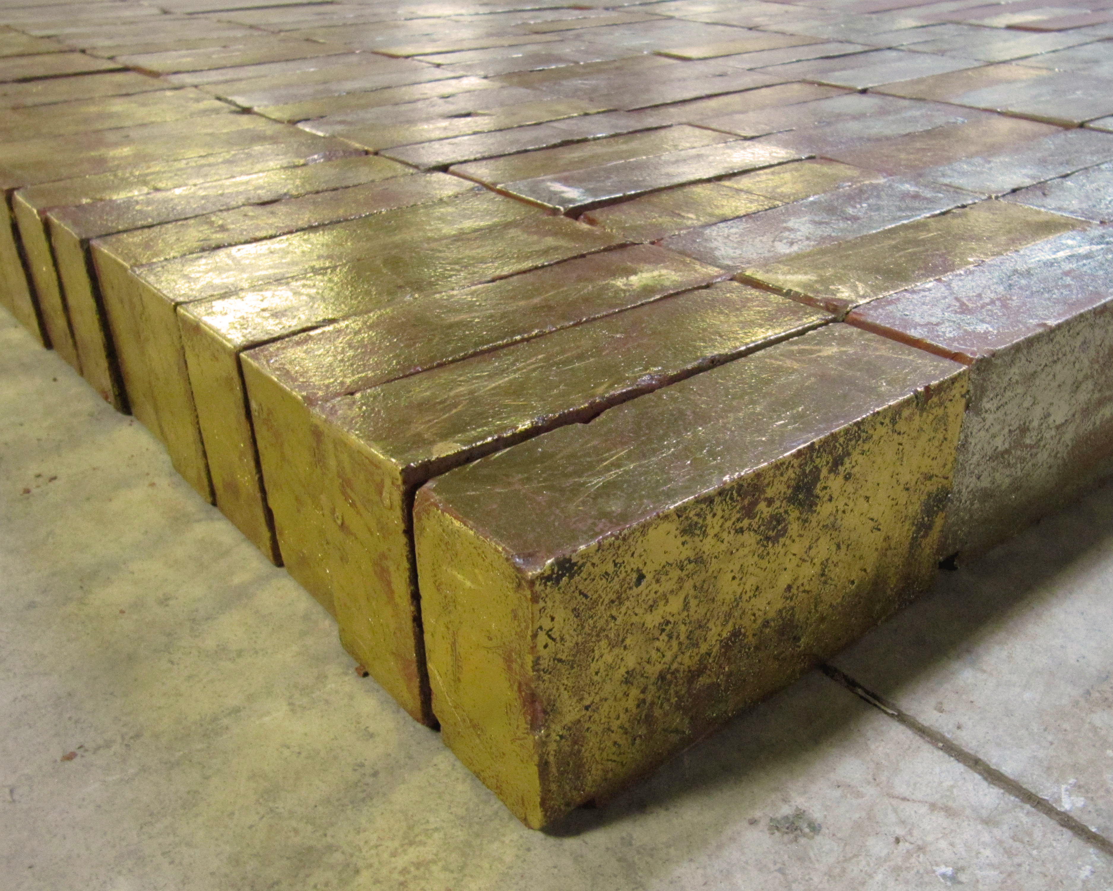 Some Kind of Way, 6 x 25 feet x 3.75 inches, 1,000 bricks and hot-pressed foil