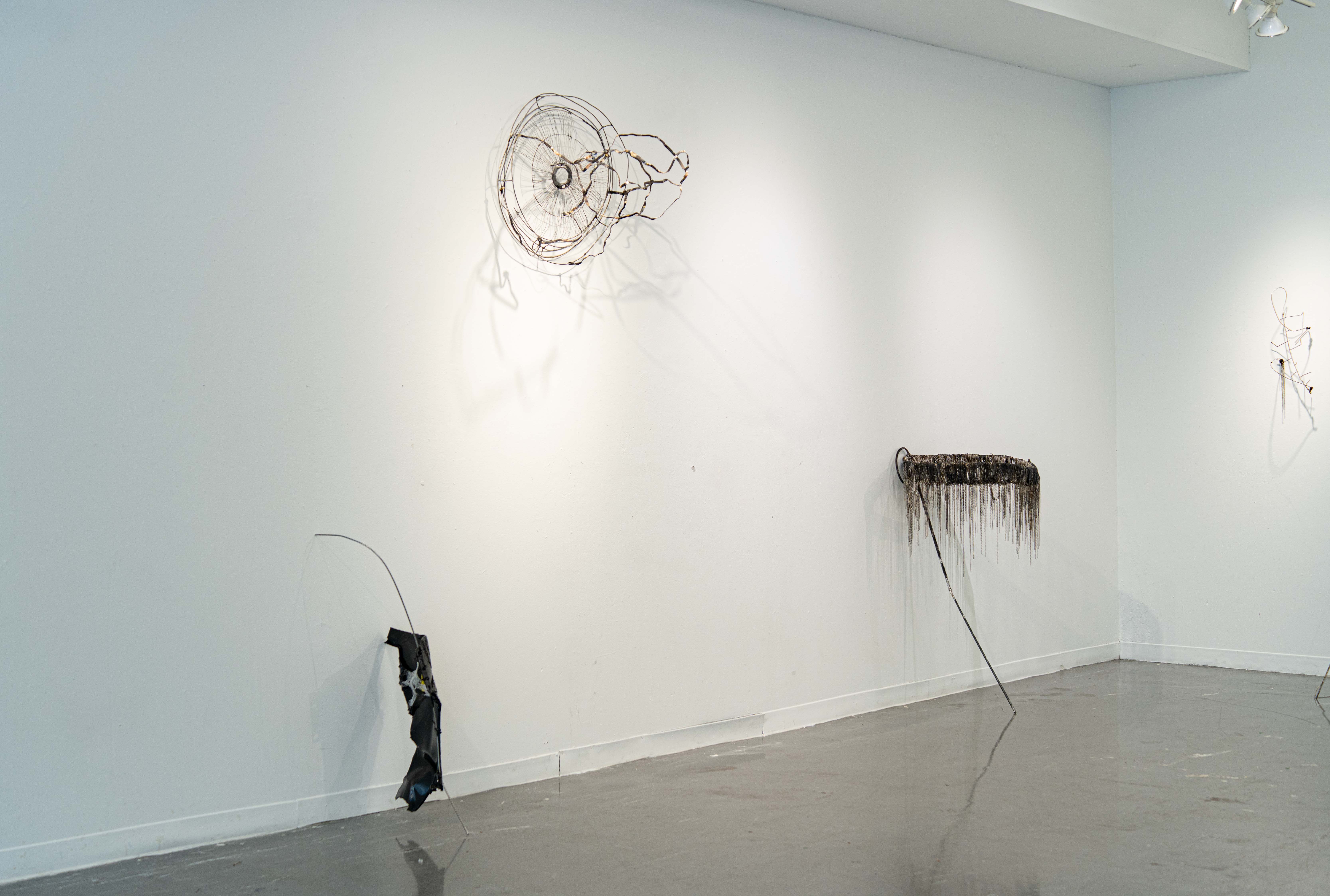 Fallen Angel (left), Untitled Fan (Senko) (on wall), Streetlight (right)