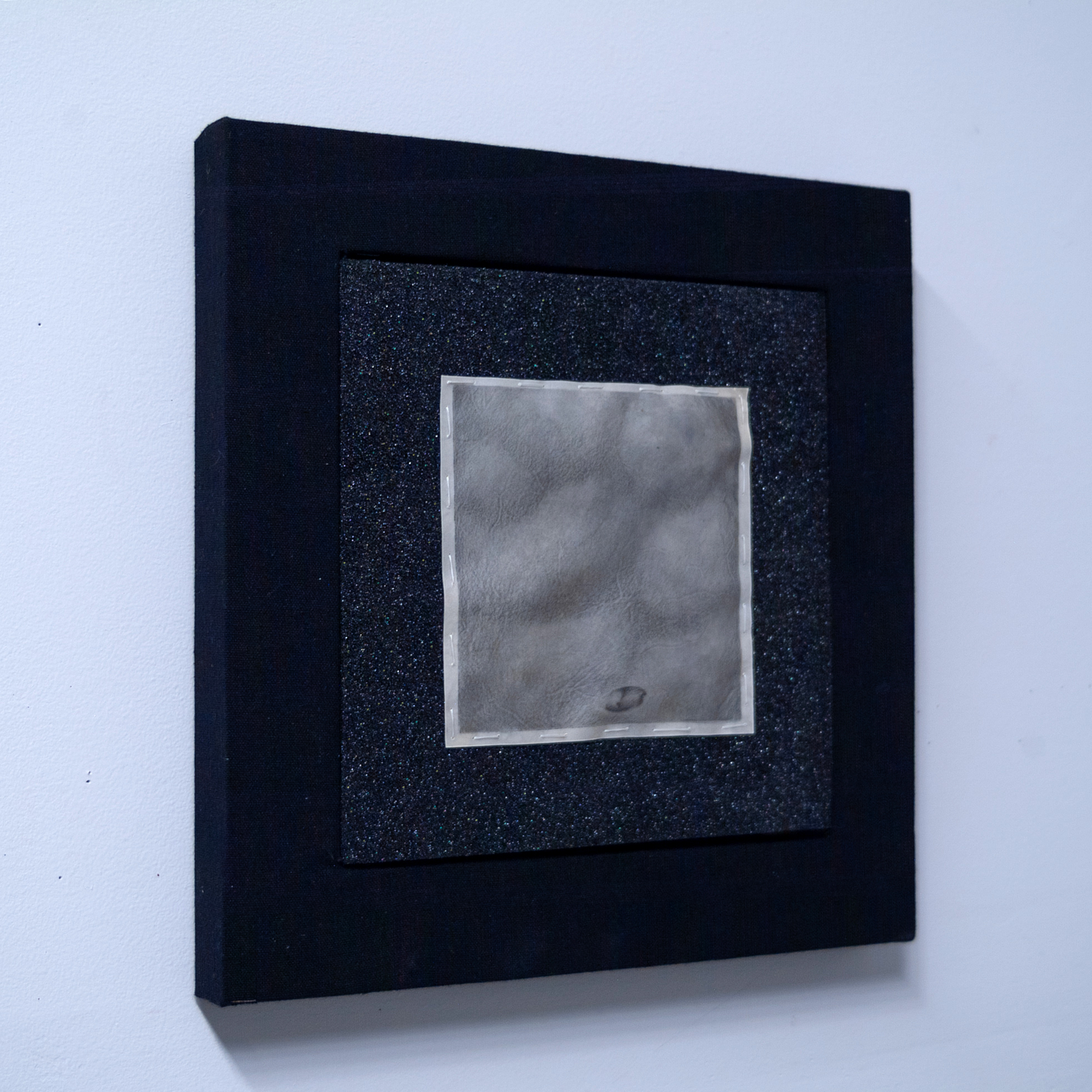 Pound For Pound/ graphite on calf vellum, thread, high density foam, canvas frame / 14 1/4 x 14 1/4 in / 2025