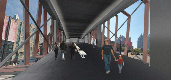 As you move through the bridge, the steel rings and columns frame the views to the East and West. The bridge diverges to the two entrances on the old market side to integrate the structure into the existing conditions of the facade.