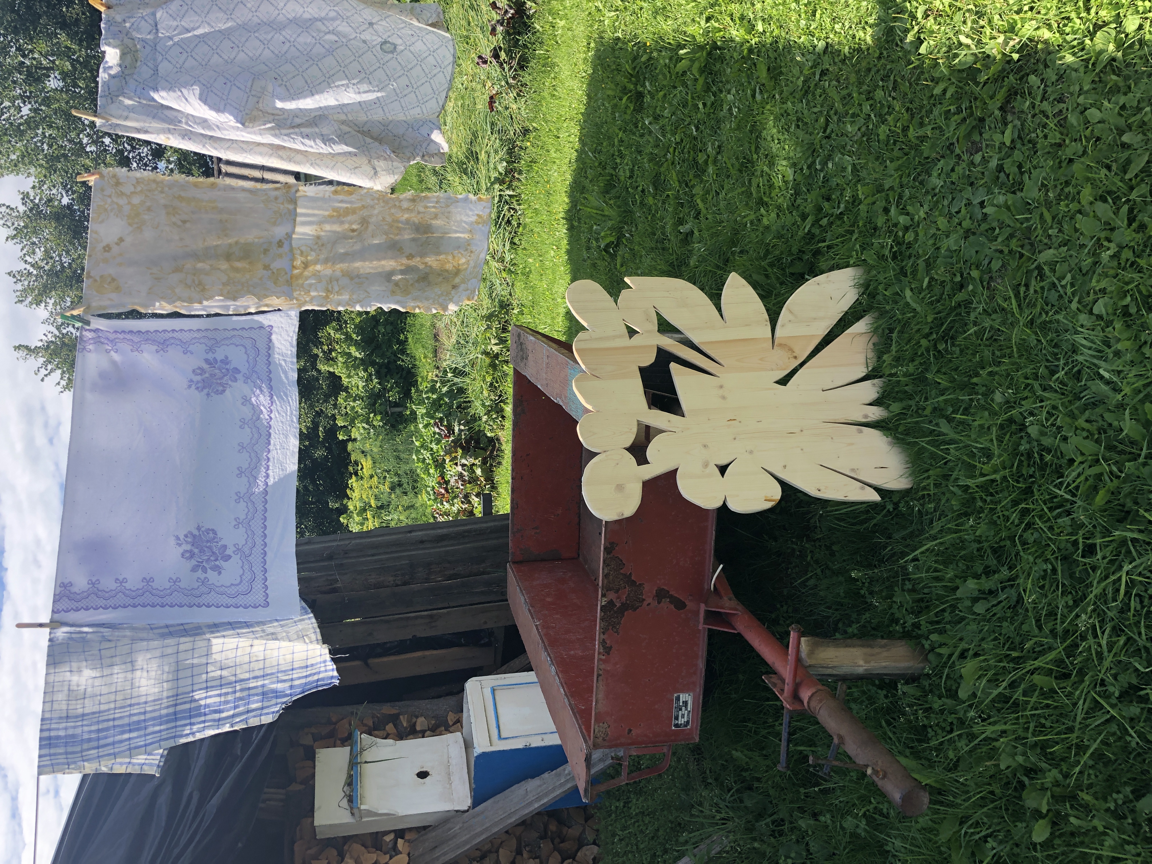 Grandfather chops wood in th'woods 'n hauls 'em home with his trusty cart.