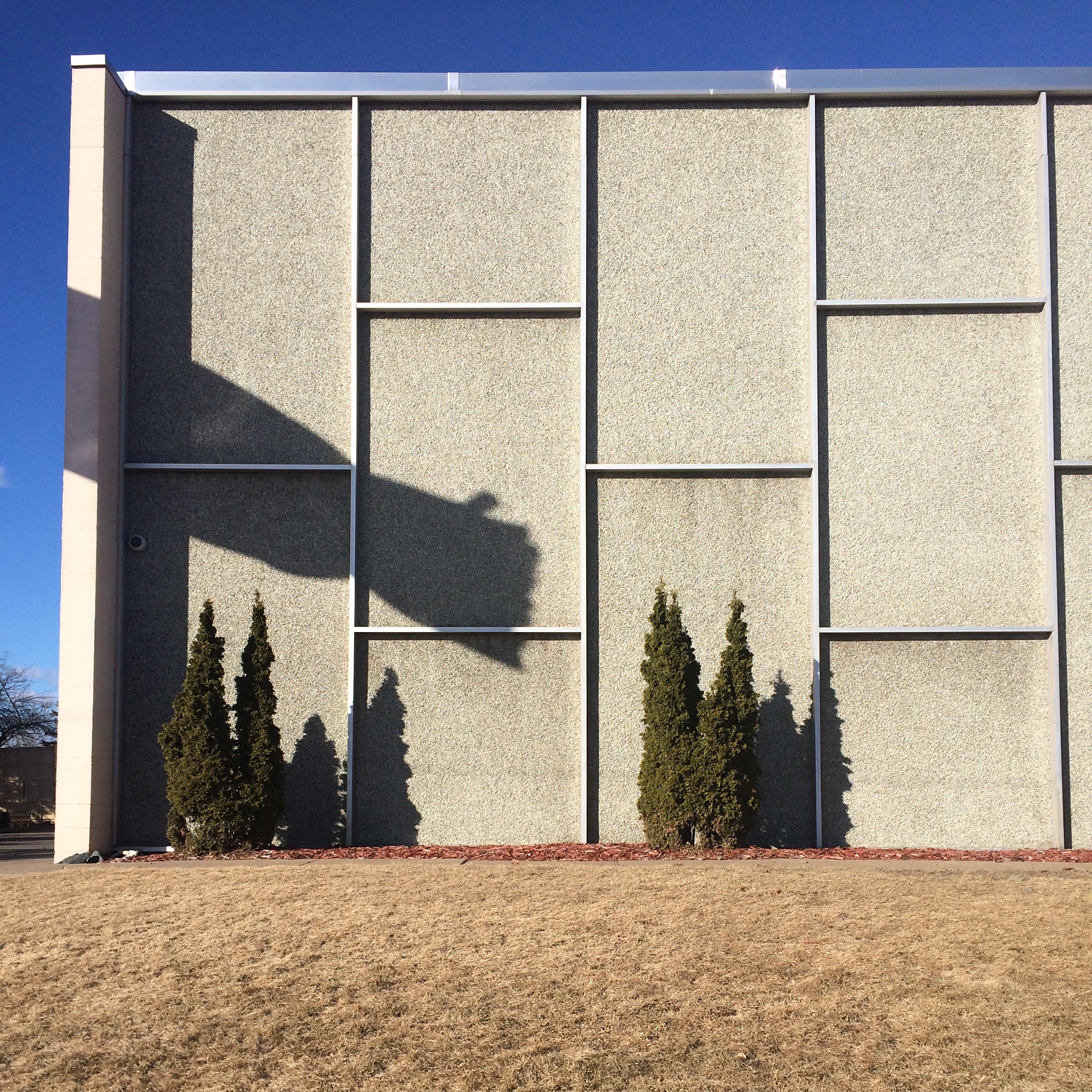 Shadow on a wall, Mid-City Industrial