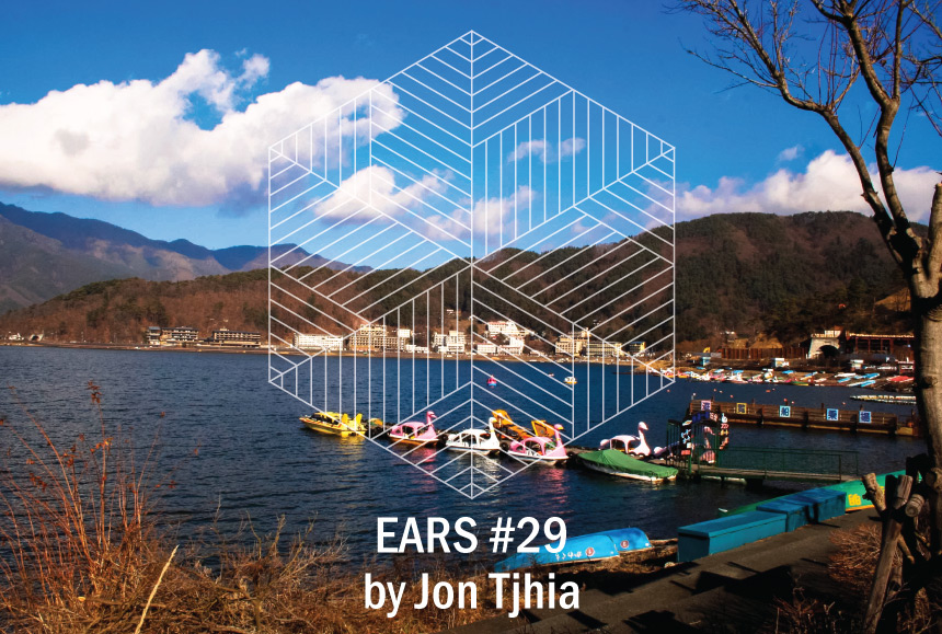 Tile image featuring a picture of paddle boats on a blue lake in Japan