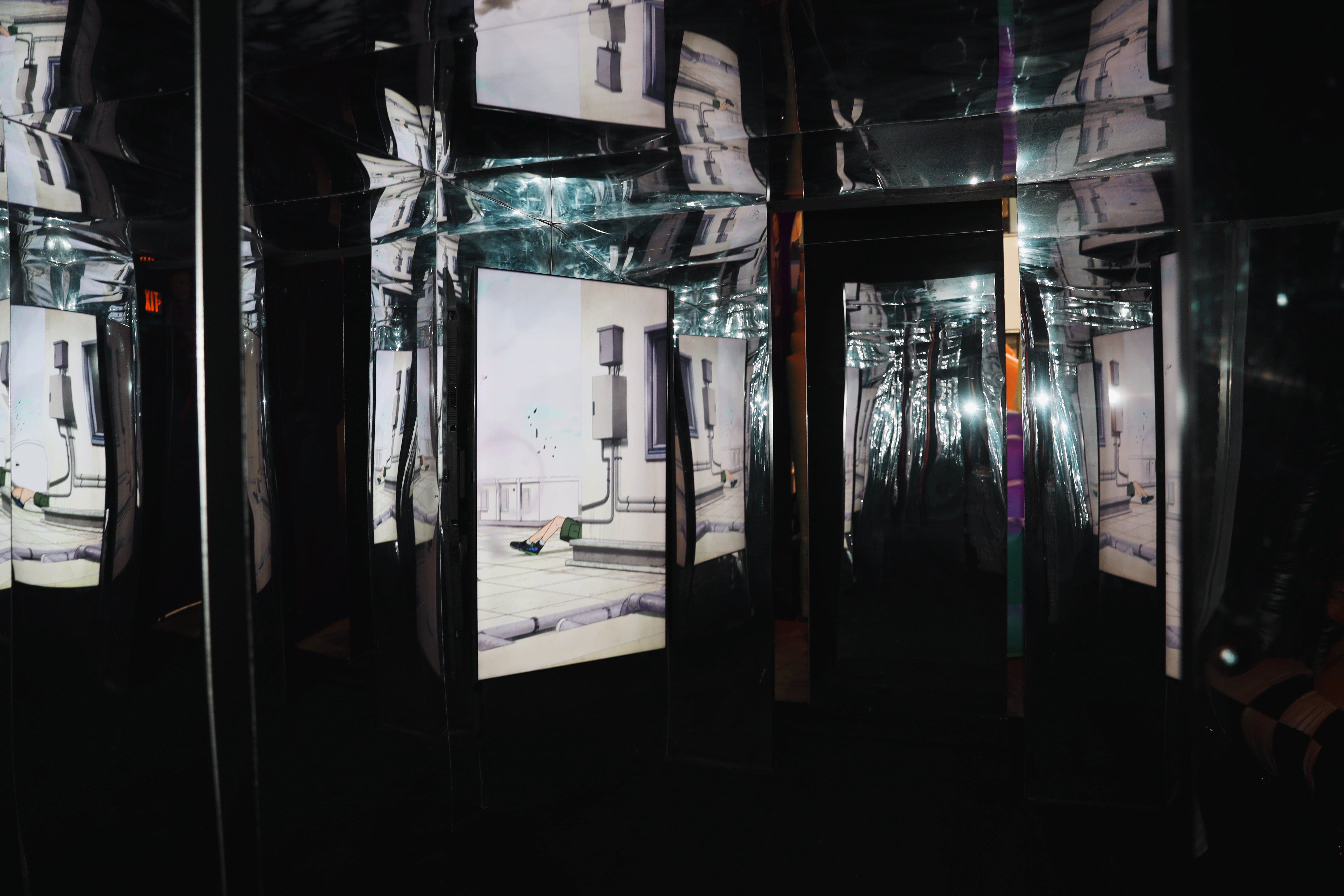 SECOND SECTION: Guests find their way through a hazy maze where a Sakamoto assasination scene bounces around them.