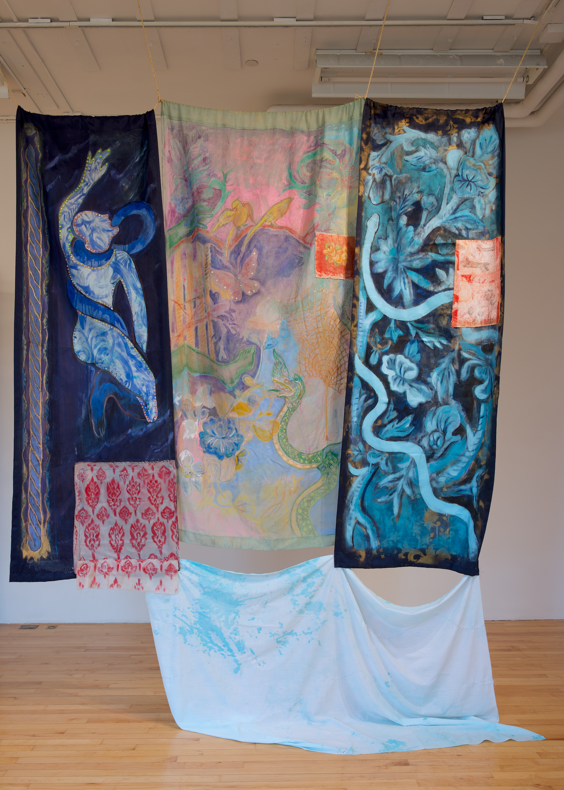 "កោសខ្យល់ (Take My Breath Away)," 2023. Acrylic, oil, spray paint, chalk pastel, gold glitter, rhinestone, pencil and acrylic on monoprints, and thread on three-panel curtains suspended by rope with fabric attachment, approx. 10 ft x 6 ft. Photo by Hyunjin Park.
