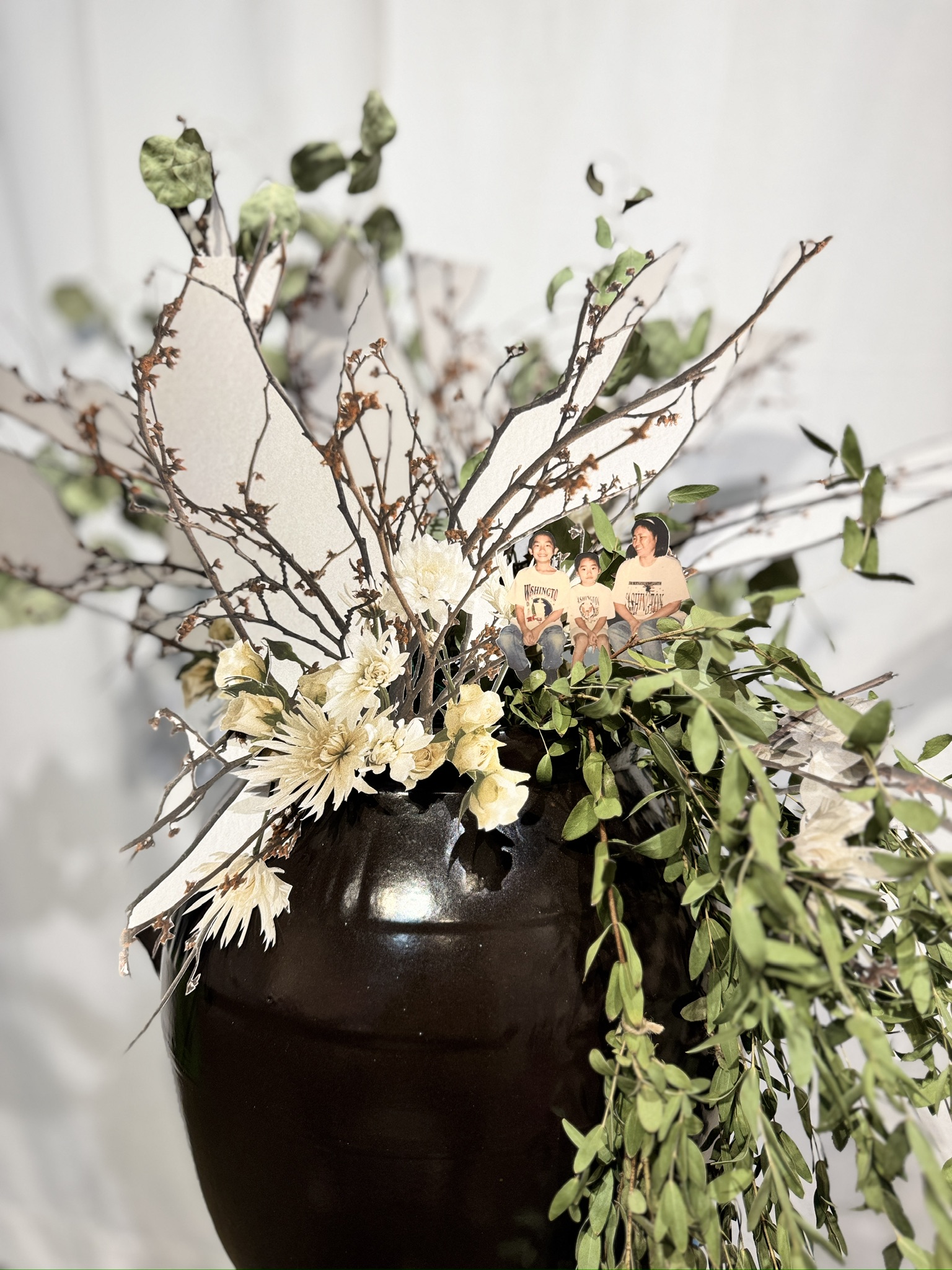 collage cocoji in hangari jars || cocoji arrangement of personal photo archives and organic materials