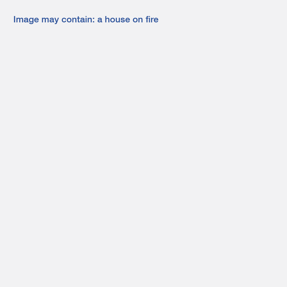 A grey square with blue text that says "Image may contain: a house on fire