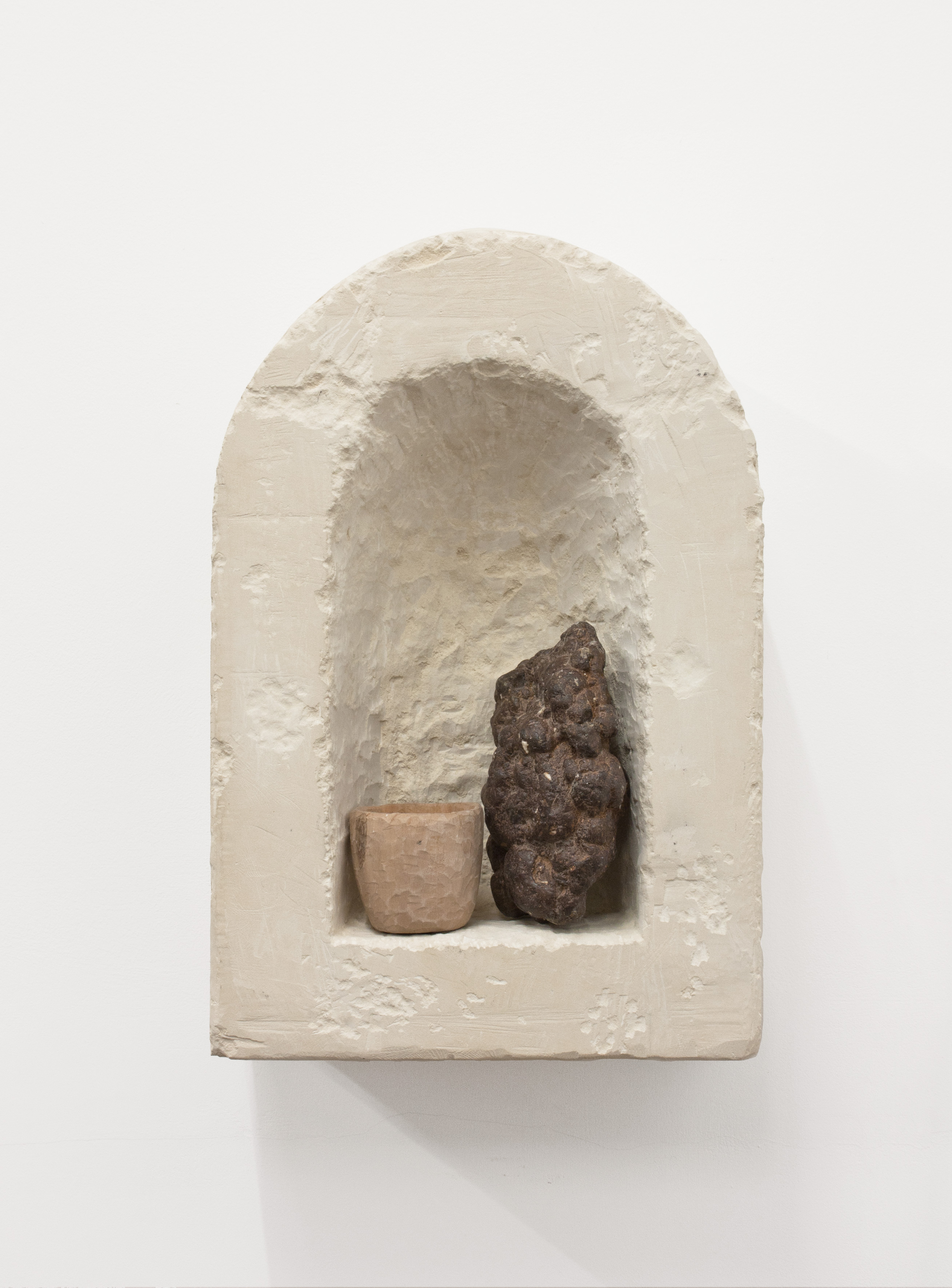 Rest here, 2019  Limestone, pear wood, iron pyrite  46 x 34 x 20 cm
