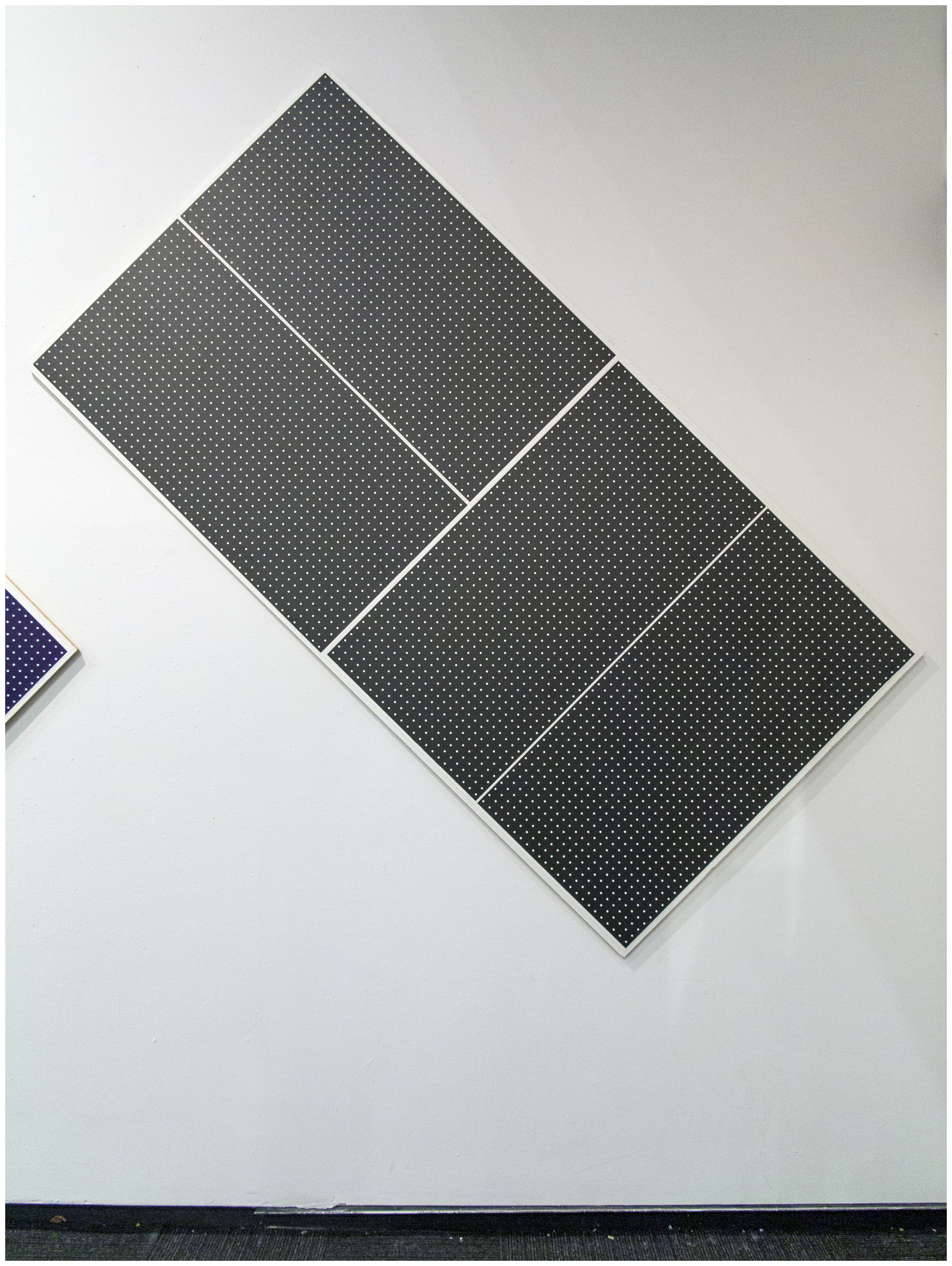 Display of Information - Portland Black (installation view), 2019Relief prints on Stonehenge paper, melamine49 x 97 x 1.125 in.124.46 x 246.38 x 2.86 cm