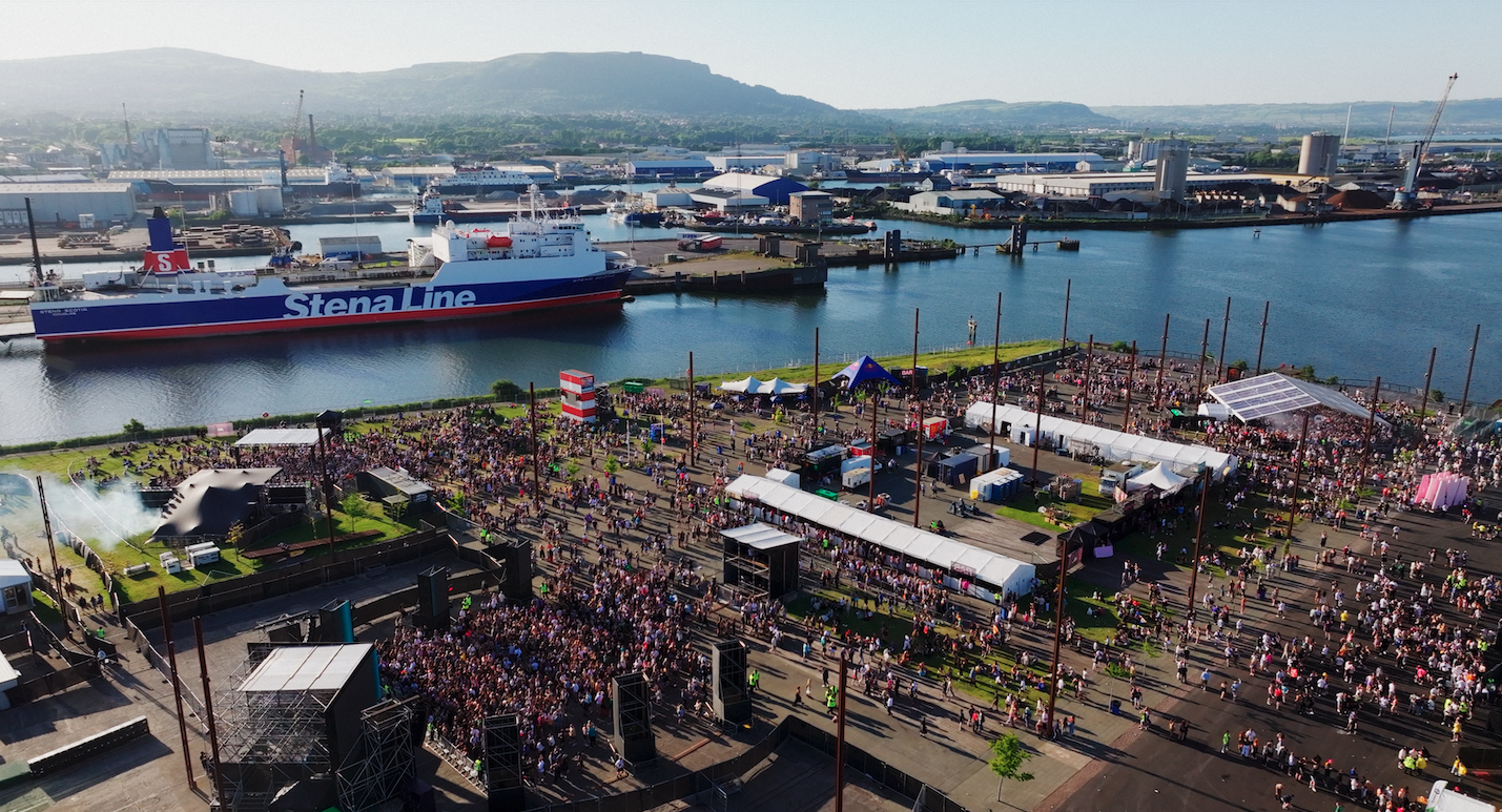 Aerial view of AVA Festival Belfast site with stages, tents, and Stena Line ship in background