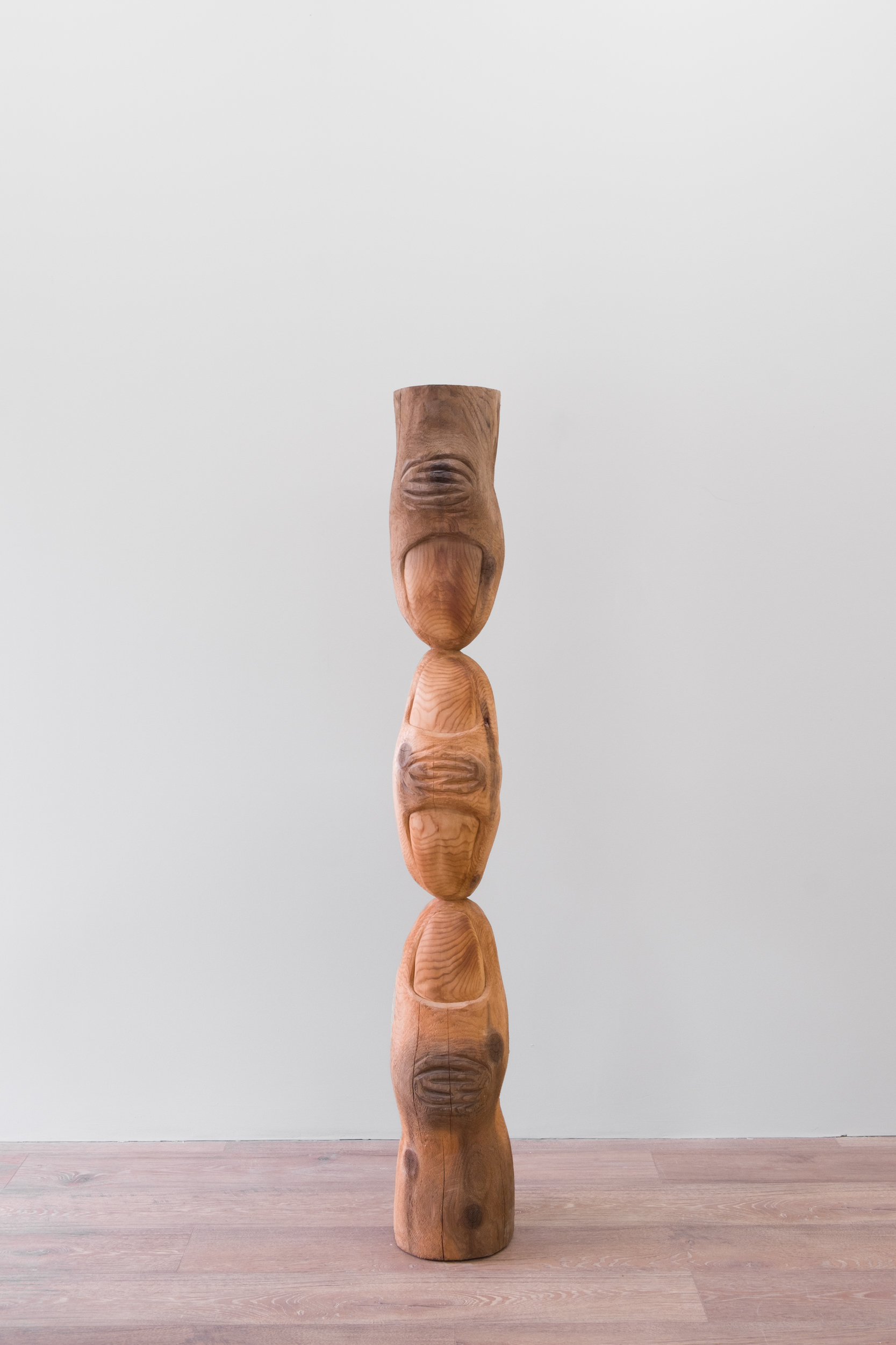 Magic Touch, 2021, 65” x 12” x 12”. Red cedar.