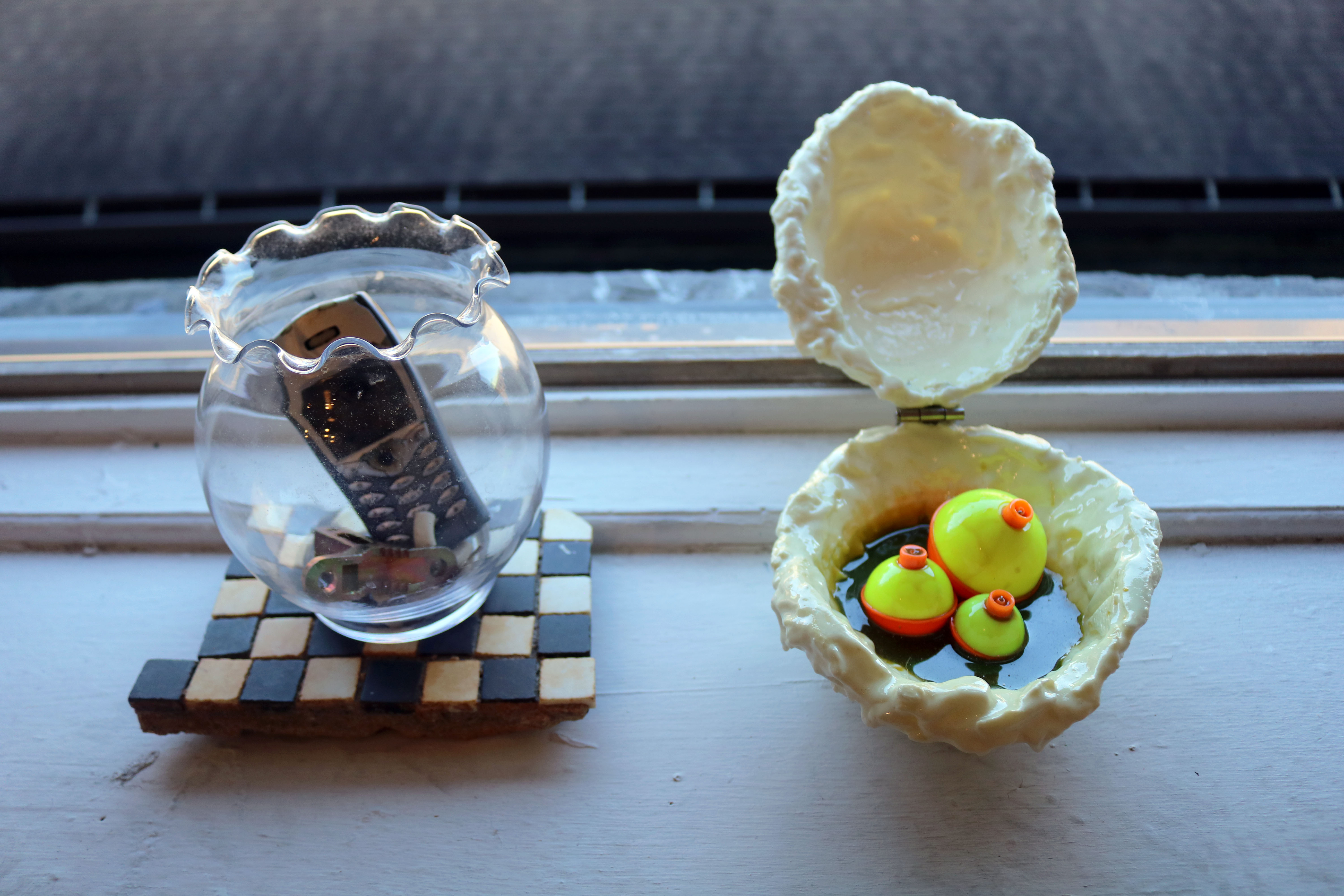 Left: fishbowl. Right: resin, buoys, metal hinge