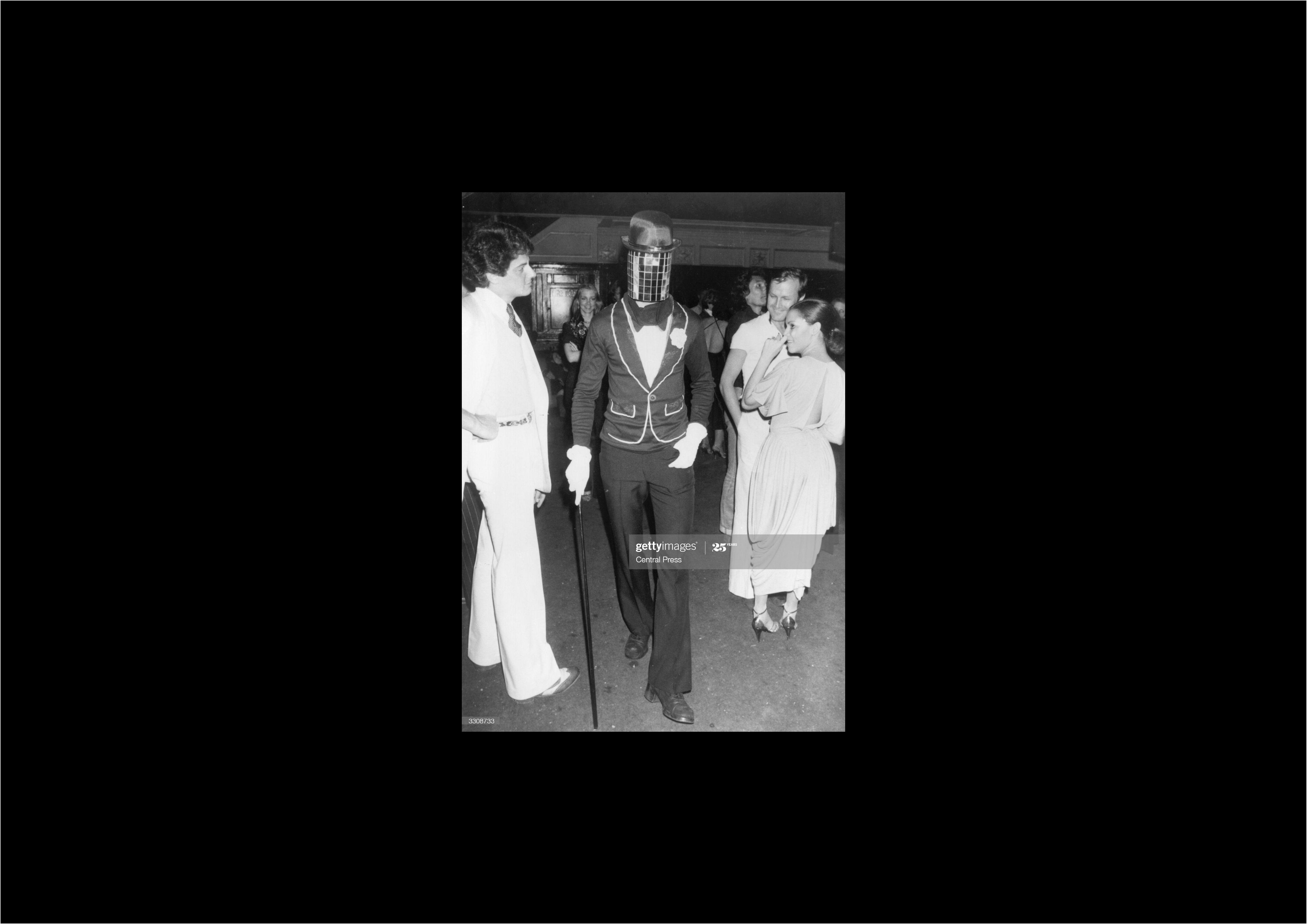 INSPIRATION: An unknowm man enters Studio 54 in a mirror glass mask (1979)