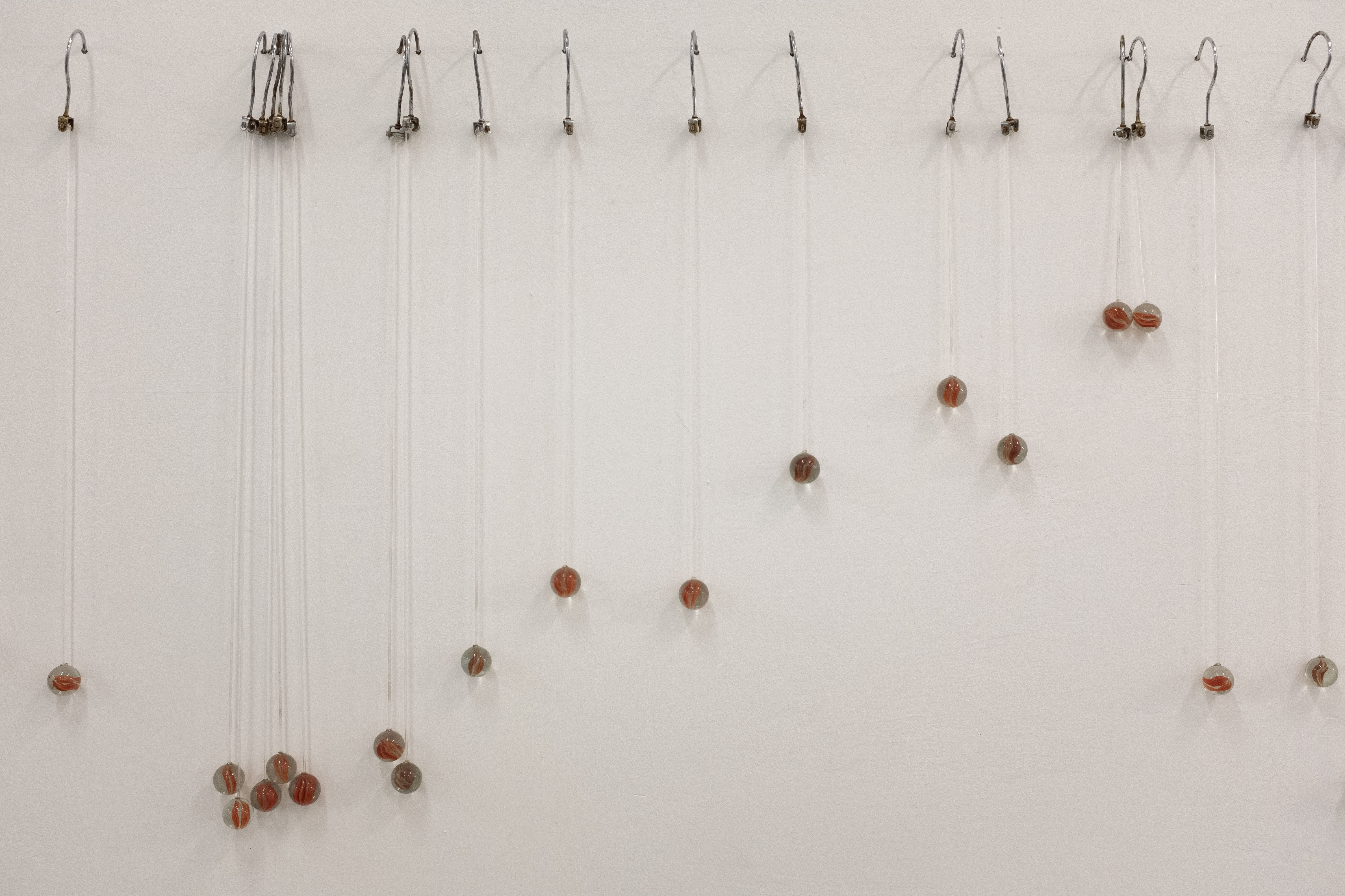 Metal hooks, silicone tubes, marbles, 100X50X10cm