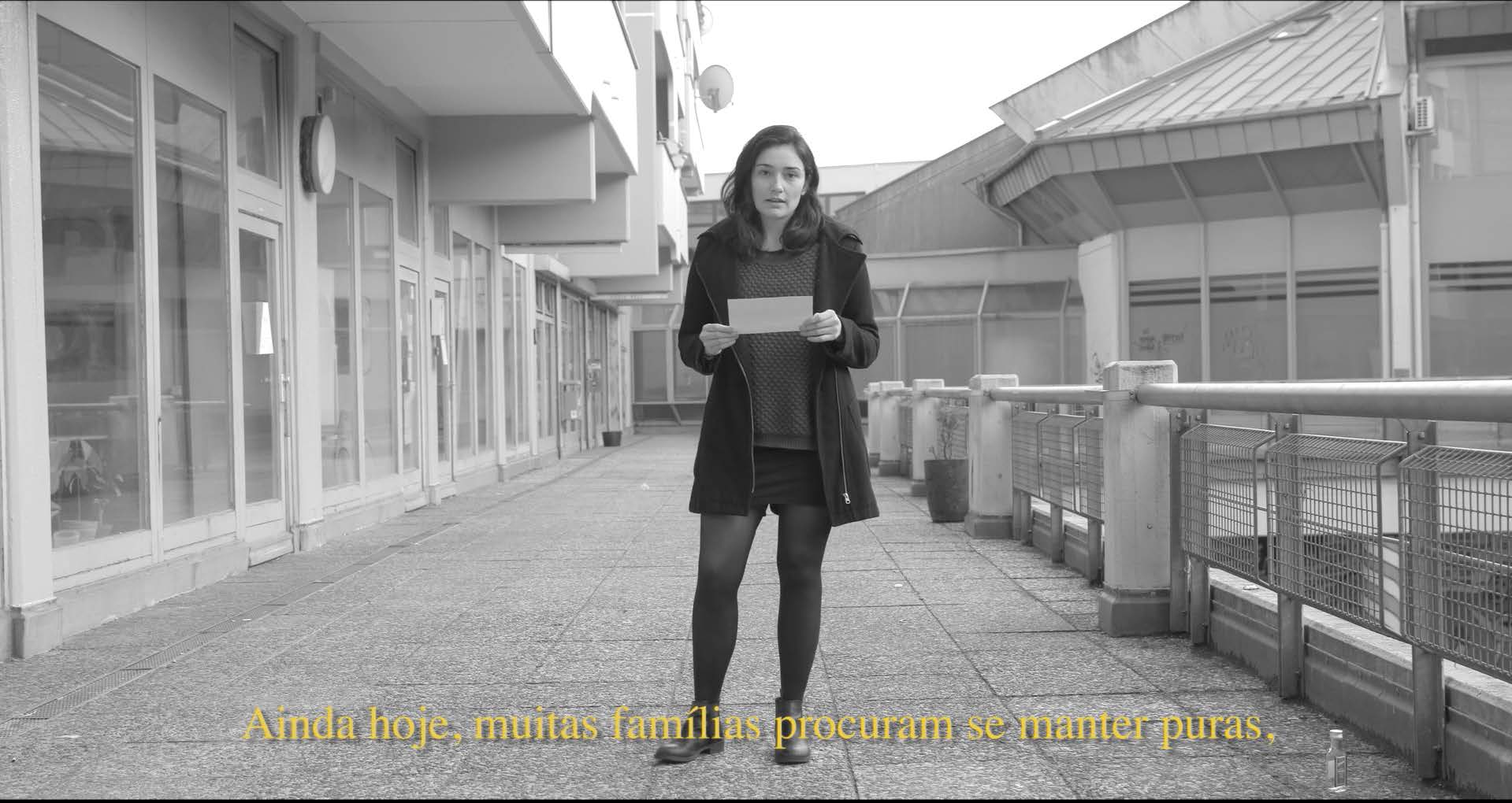 Still of Ana Hupe Women of the fourth world, 2017. Channel 1, 15'50", B/W, Full Hd, audio. Courtesy of the artist. Caption reads: “Ainda hoje, muitas famílias procuram se manter puras” [Still today, many families try to stay pure]