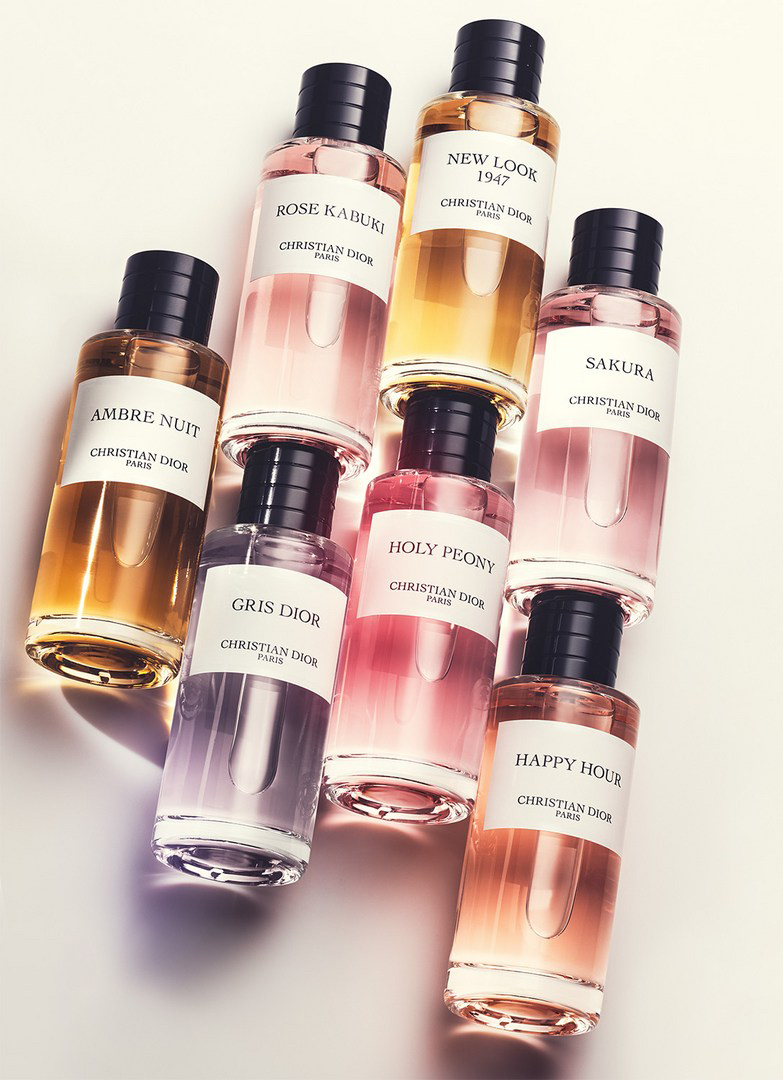 KMA stylist Sara Wacksman designs set for photo of Dior perfume bottles against white background for Bergdorf Goodman