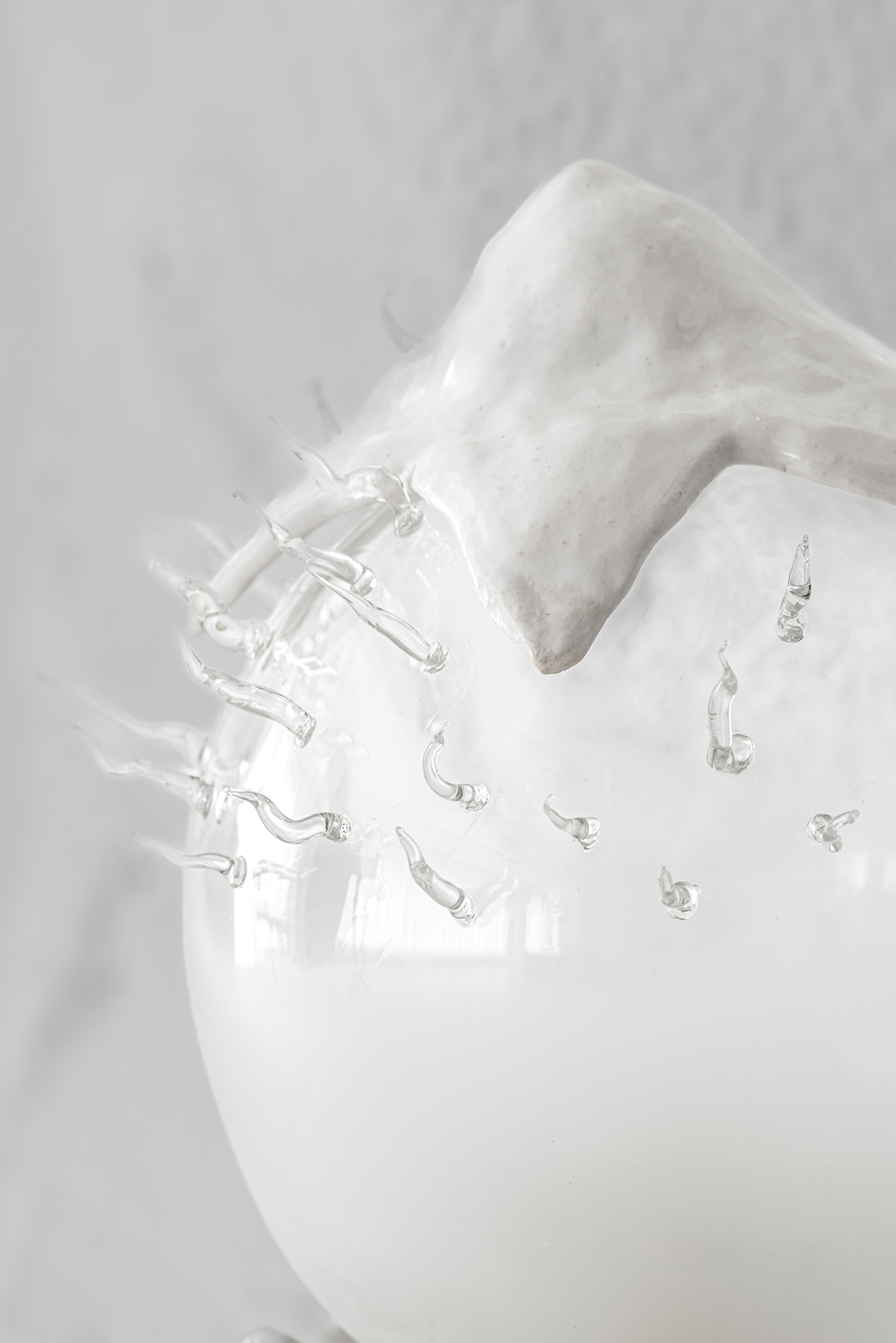 White  Porcelain and Blown Glass Lamp from Plaja Studio in front of white background, product photography, 