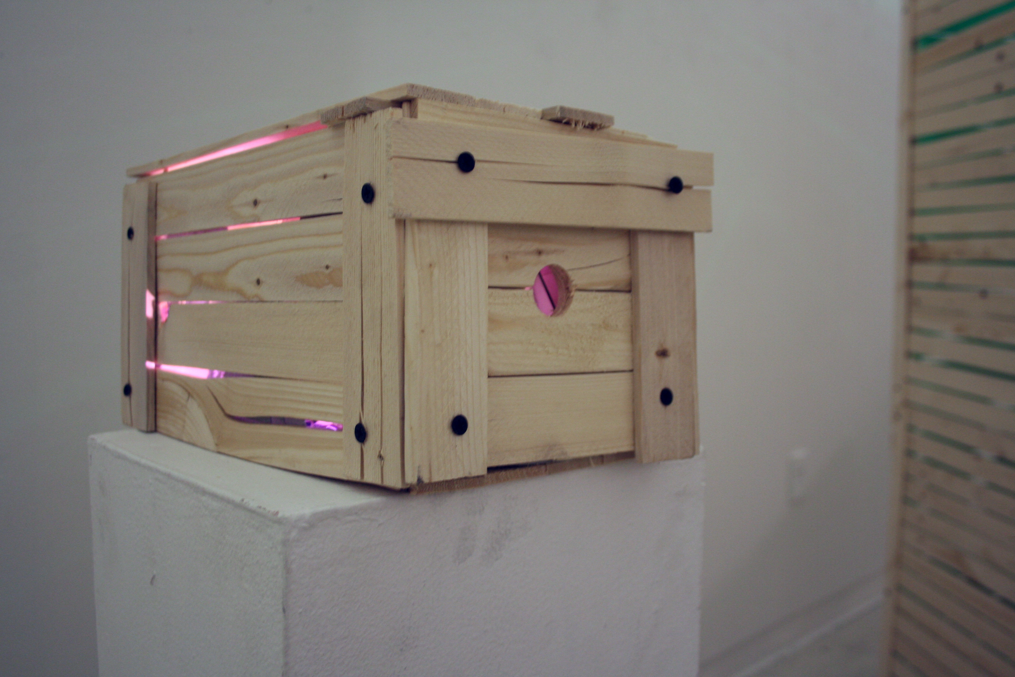 This Will Never Make It Across the Sea, 7 x 7 x 12 inches, blacklight, mirror, rock slide, and wood