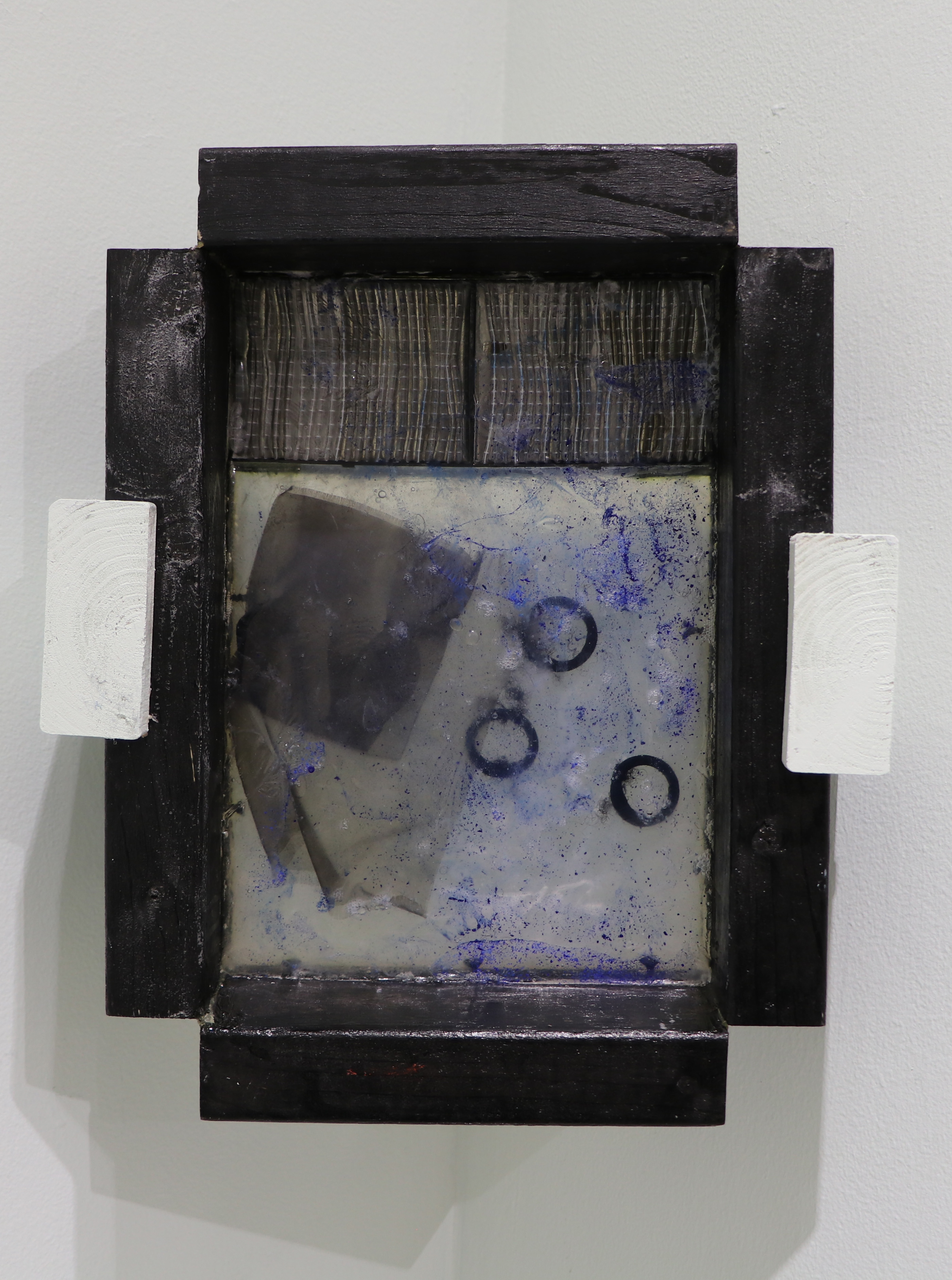 soles club (2024.) transparent soap, projector vent, inkjet print on silk, soft pastel, hair ties, hair, wood. 15&rdquo; x 11."